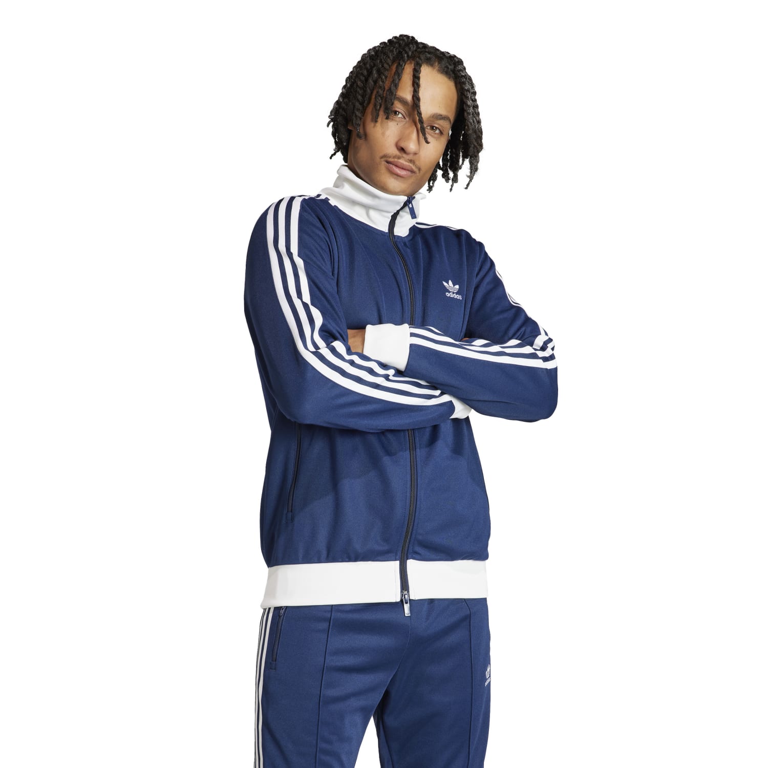 Close-up of the Adidas jackets three stripes, highlighting its classic style.