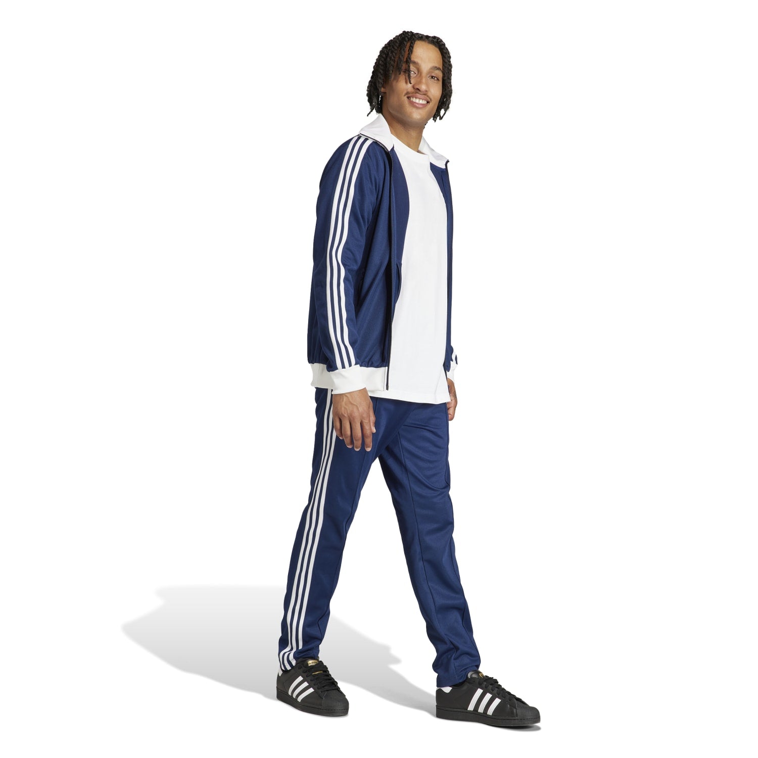 Side angle of retro adidas mens pants highlighting the stylish fit and zip features