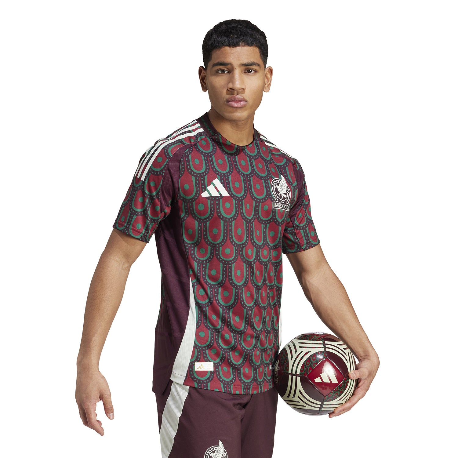 Lifestyle shot of a fan wearing the Mexico jersey at a game or casual setting