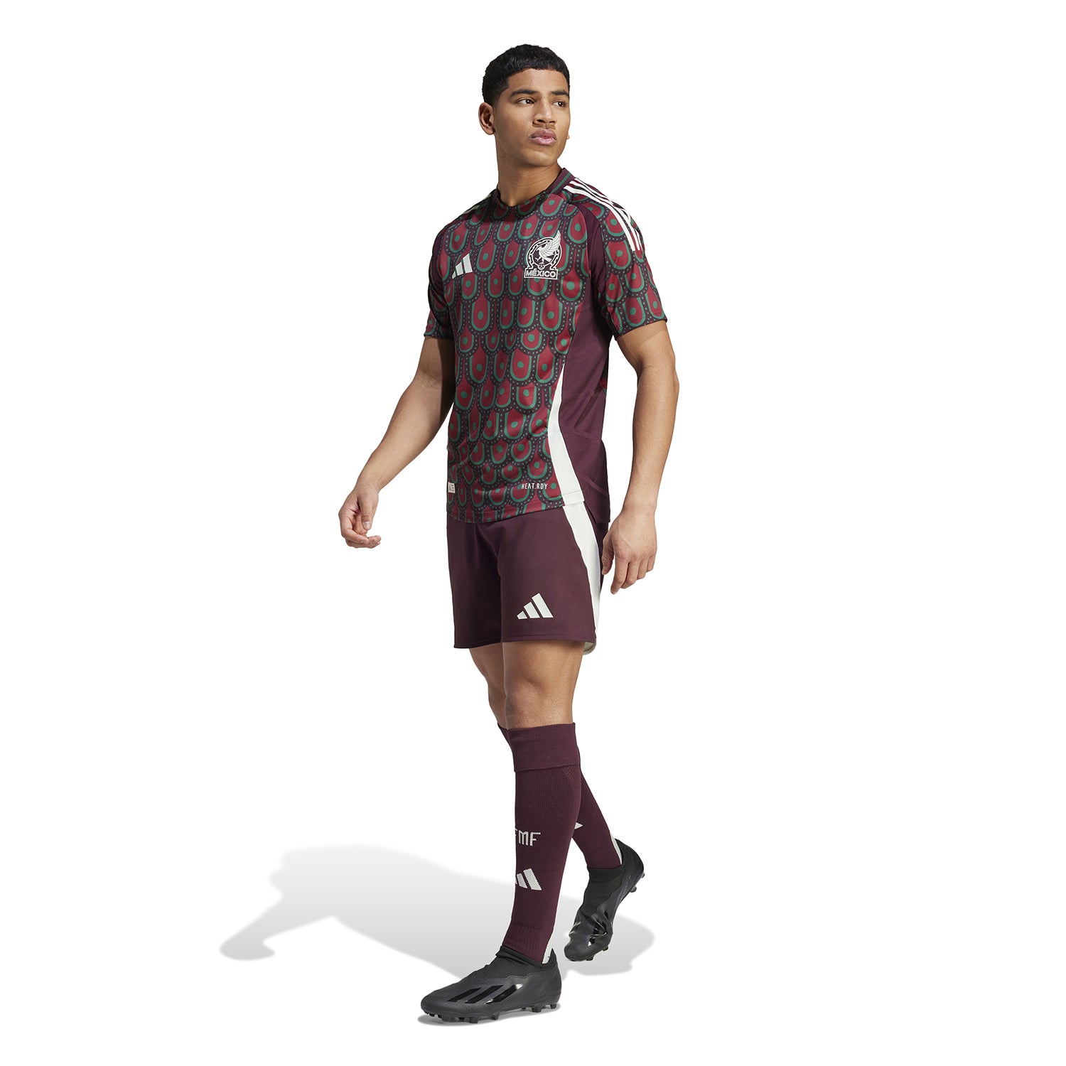 Front view of the Mexico 24/25 home football jersey on a model, showcasing the team insignia and adidas logo