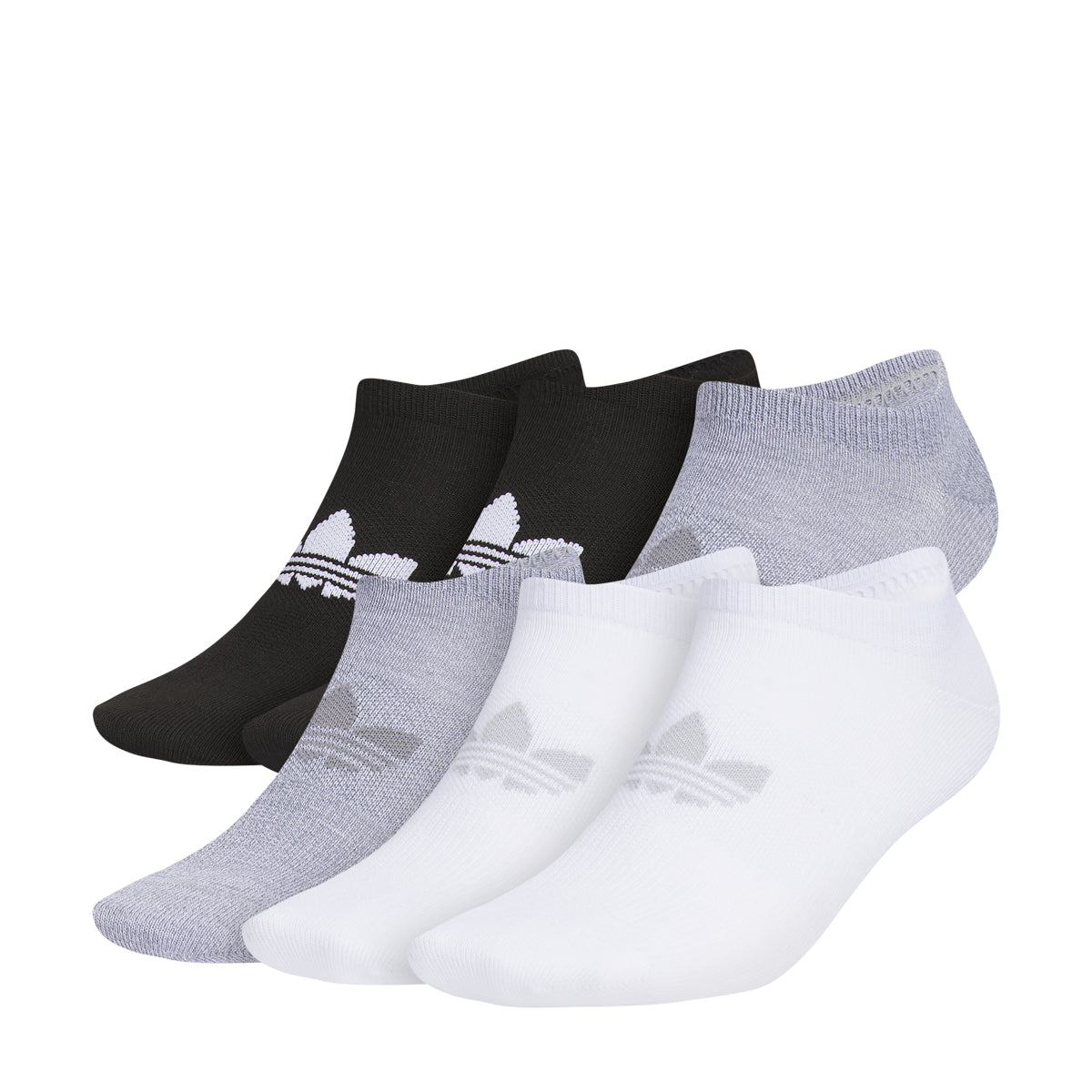 Flat-lay of six pairs of adidas superlite no-show socks in grey, black, and white on wood floor