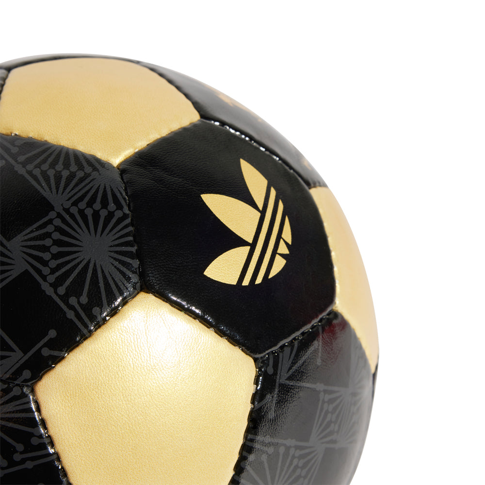 Close-up of textured surface and logo on FMF Mexico Trefoil ball