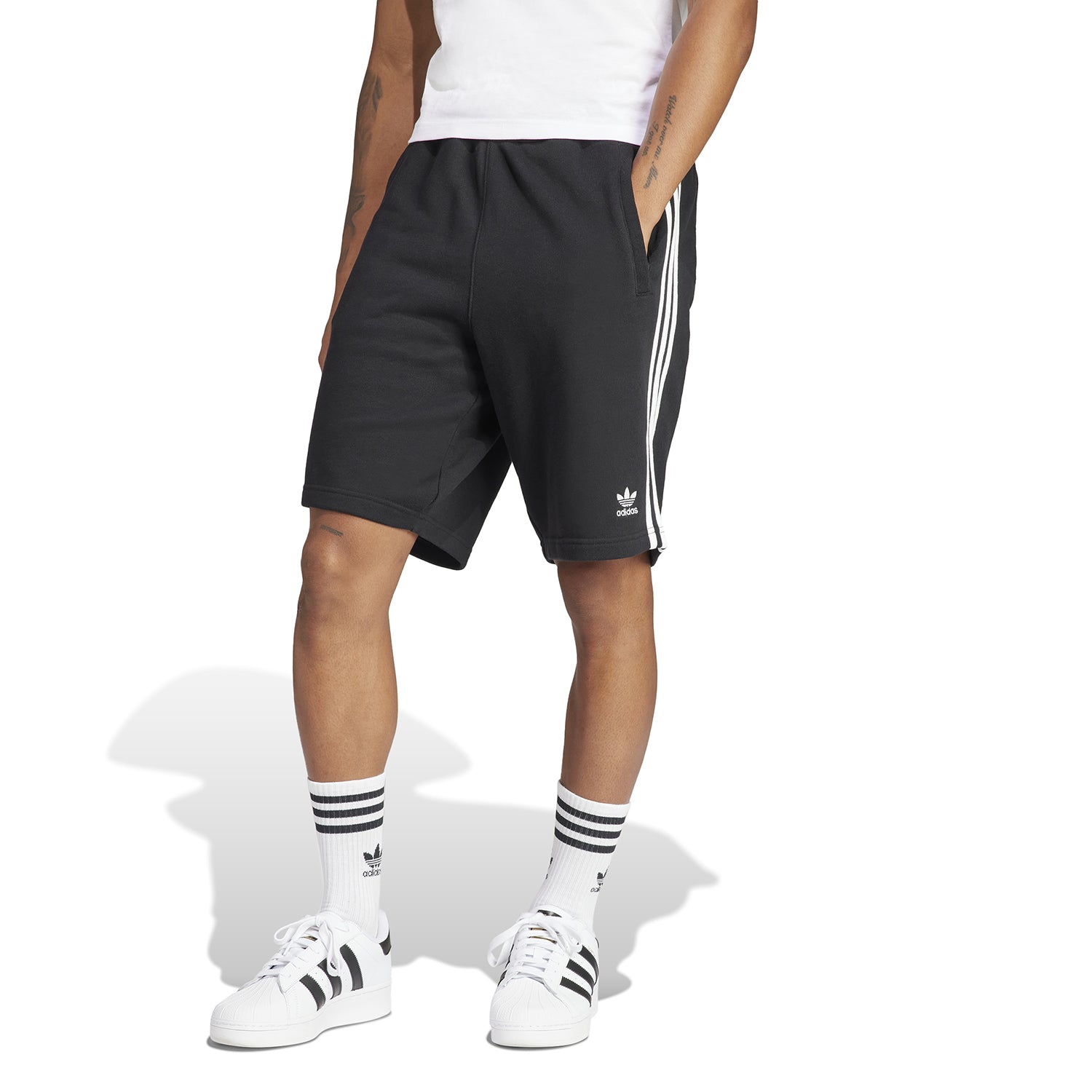 Close-up of the elastic waistband and drawstring on Adidas mens shorts.