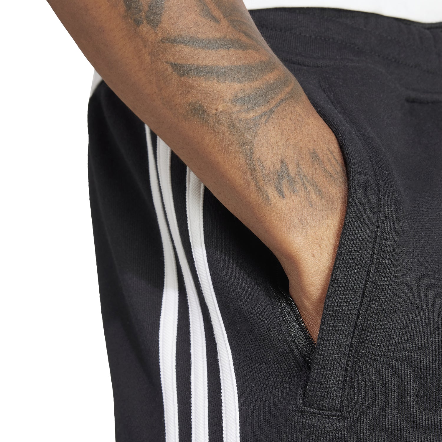 Adidas mens athletic shorts with three stripes, perfect for workouts.