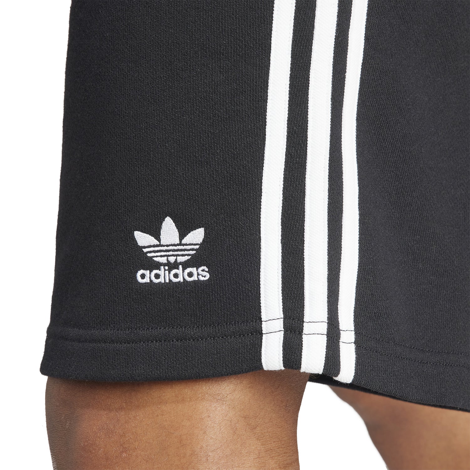 Close-up of the elastic waistband and drawstring on Adidas mens shorts.