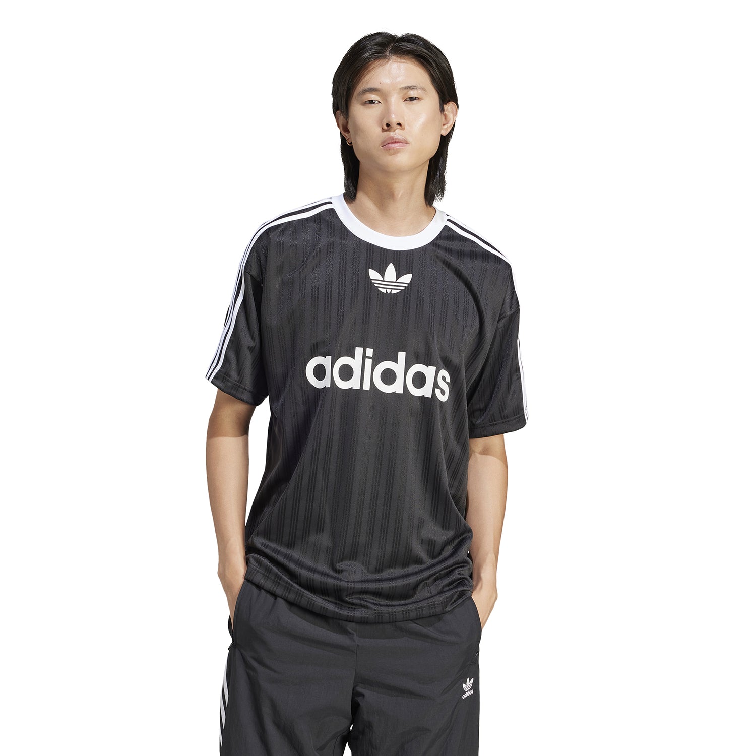Close-up of fabric and crew neck on mens sports shirt
