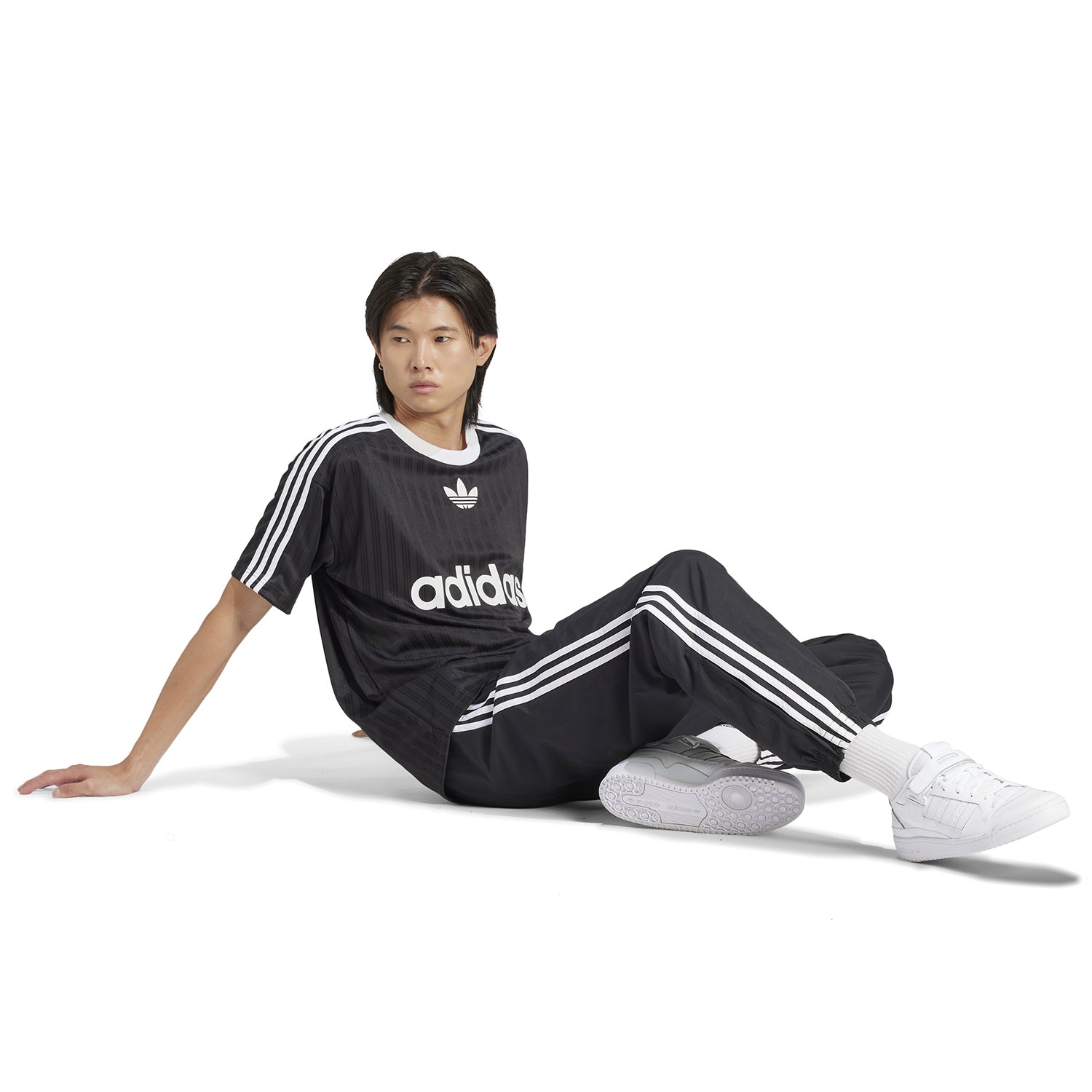 Model wearing adidas jersey during workout