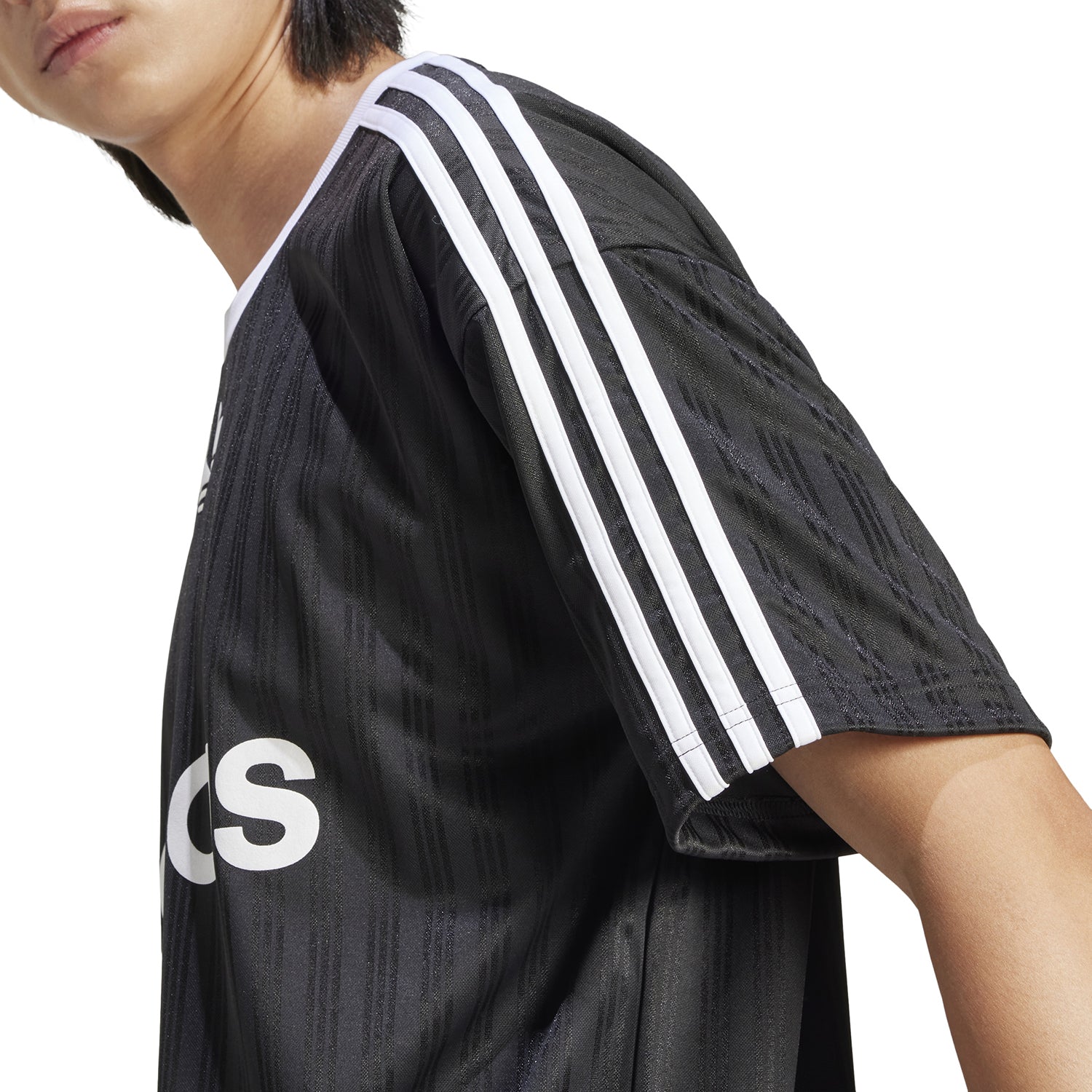 Close-up of fabric and crew neck on mens sports shirt