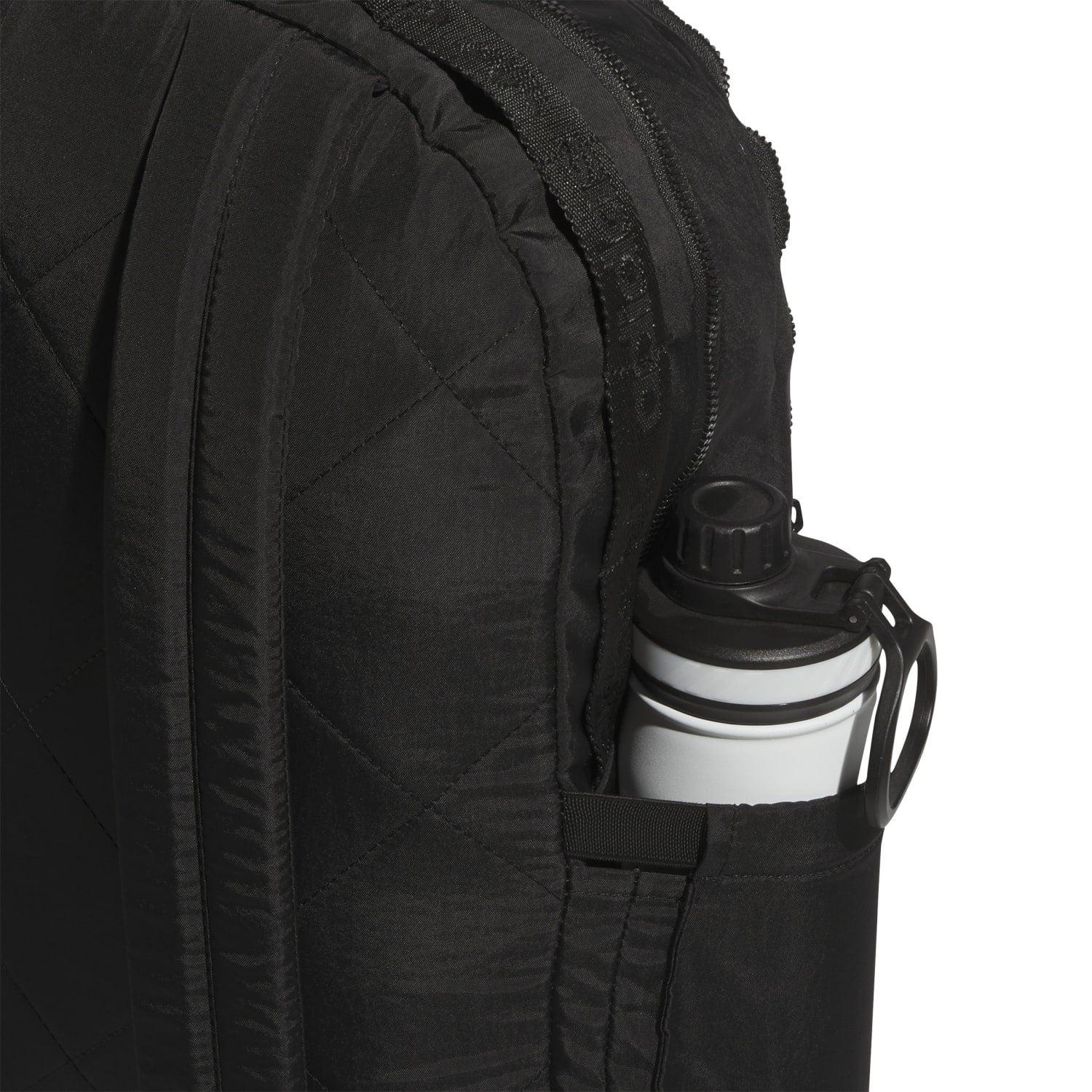 Front view of Luna Originals laptop backpack showing sleek black canvas and discreet logo patch
