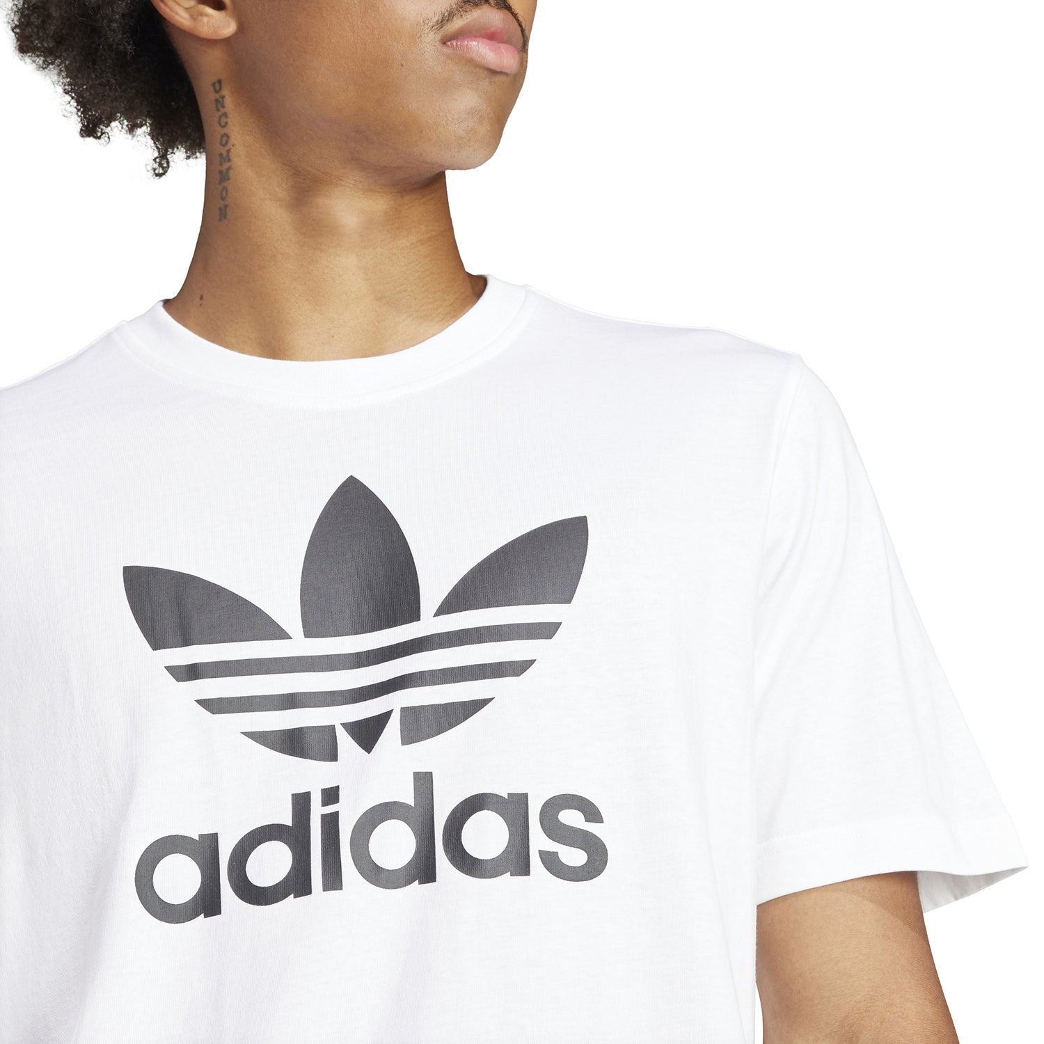 Front view of the Adidas Trefoil Cotton T-Shirt for Men, highlighting its soft fabric and classic fit.