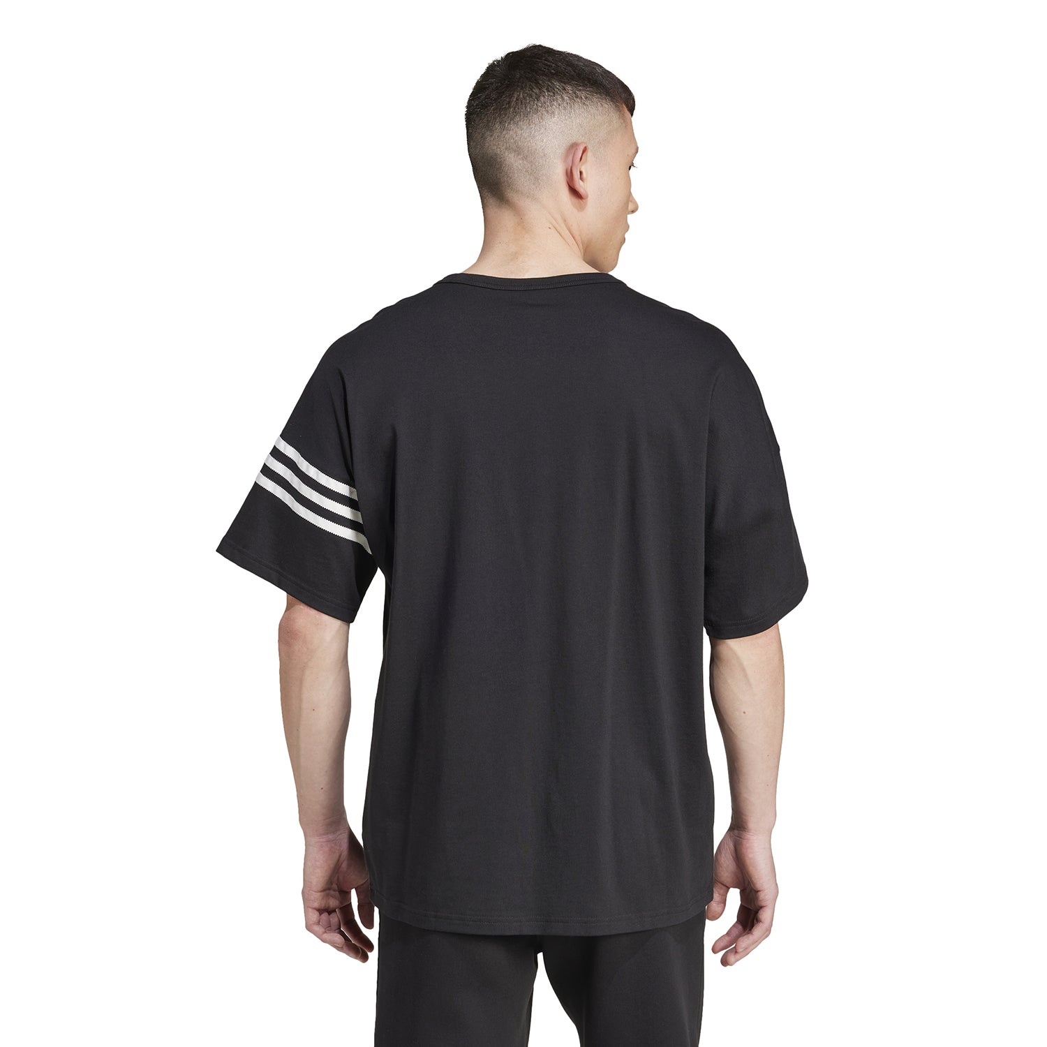 Casual styling of the Adidas mens t-shirt paired with shorts, perfect for summer outings.