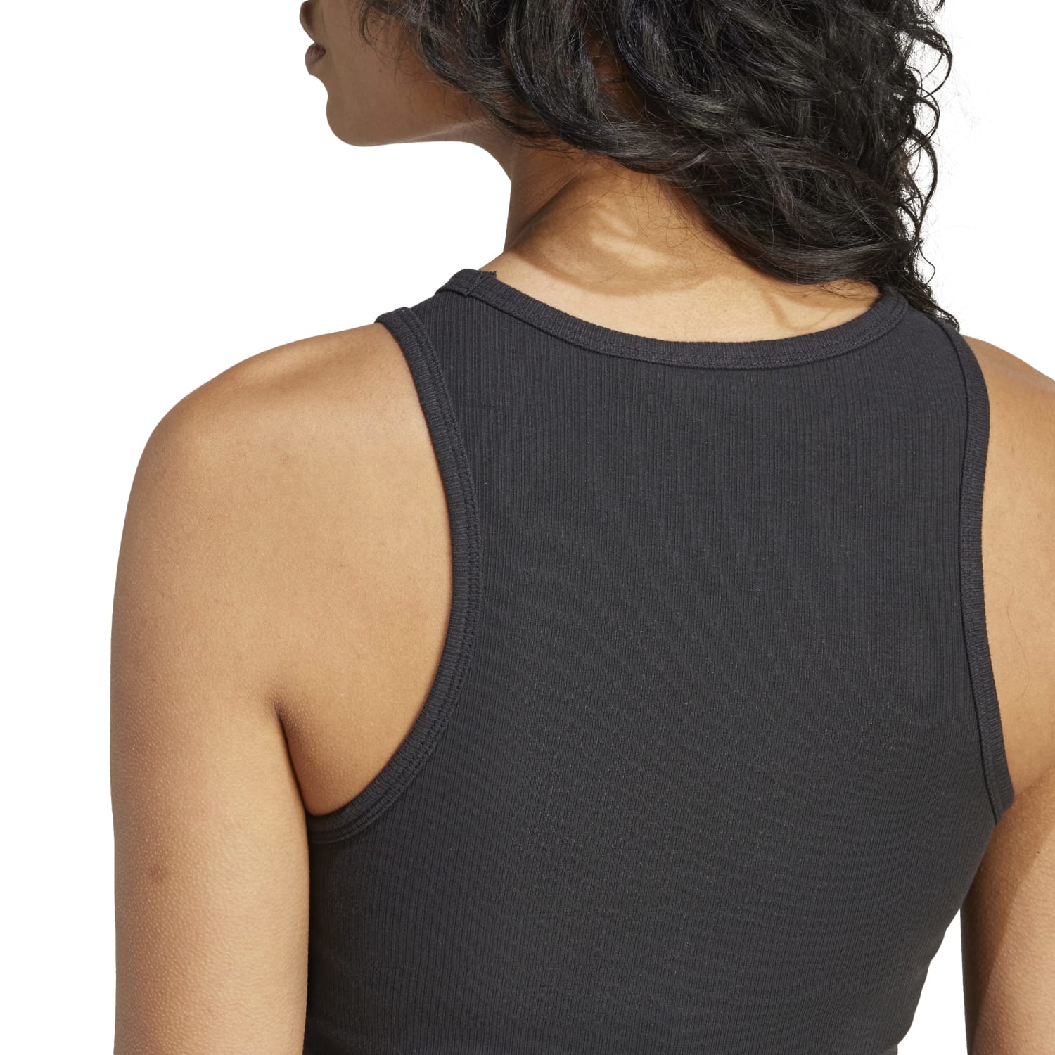 Side view of the womens tank top, ideal for summer workouts, demonstrating its comfortable fit and stylish look.