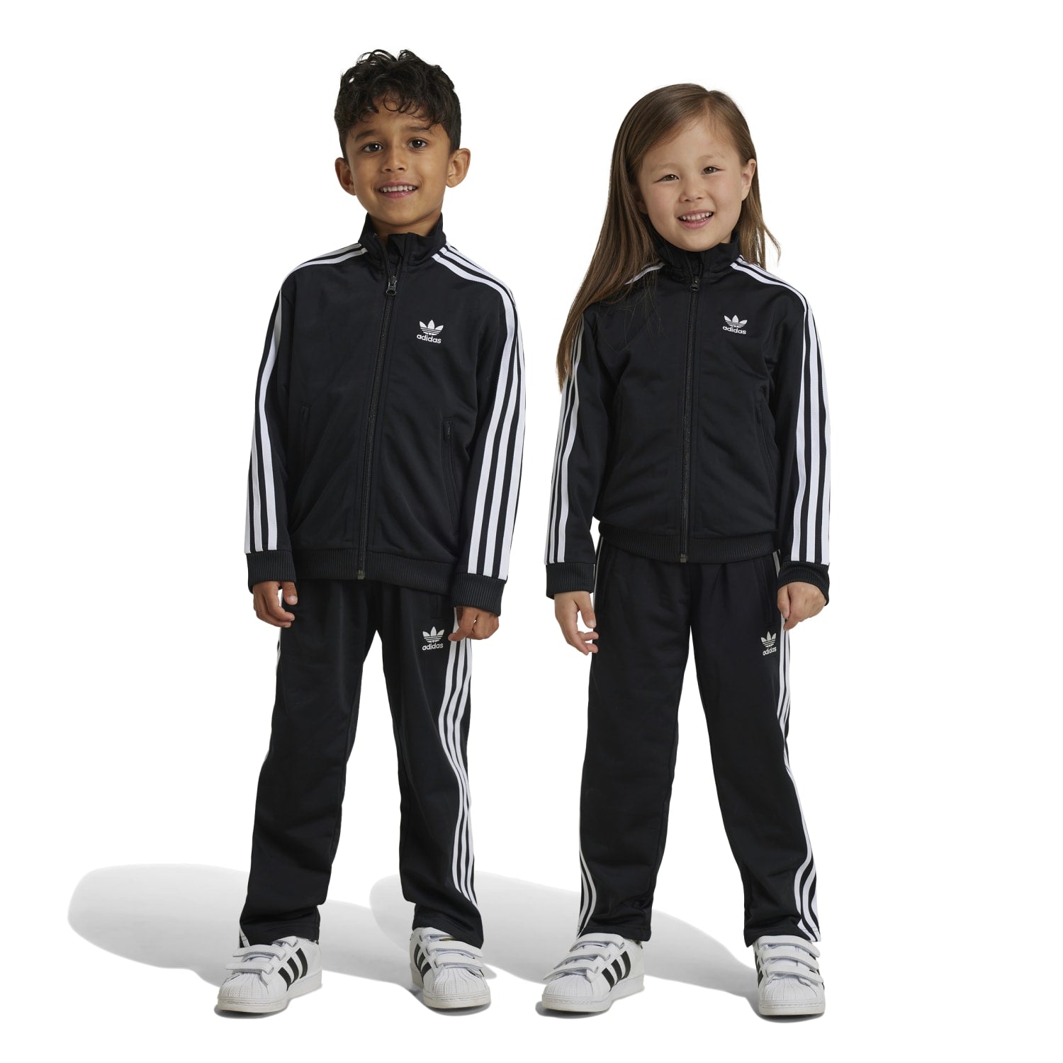 Adidas Kids Track Set featuring elastic waistband and side pockets, perfect for playtime.