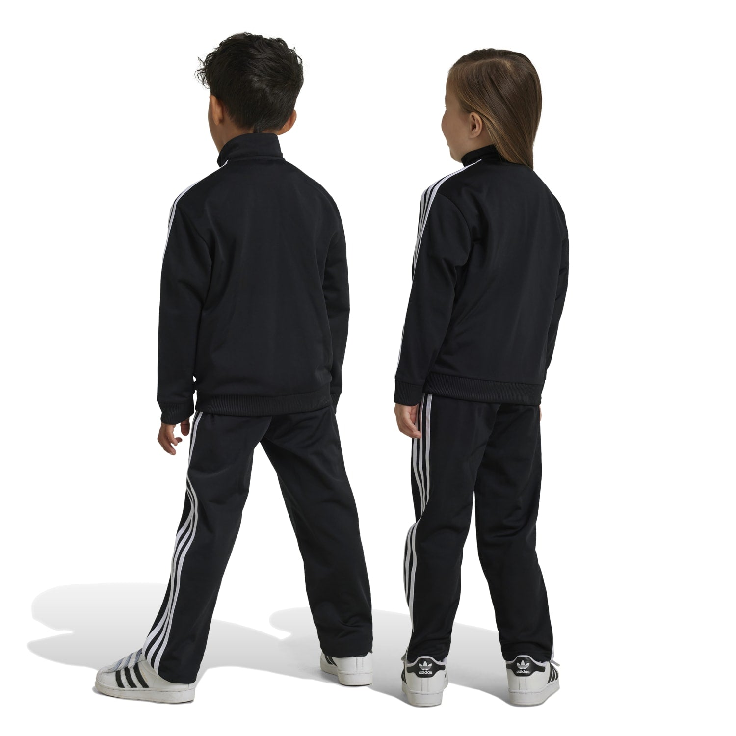 Close-up of the zip-up jacket with stand collar from the Adidas Firebird Kids Track Set.