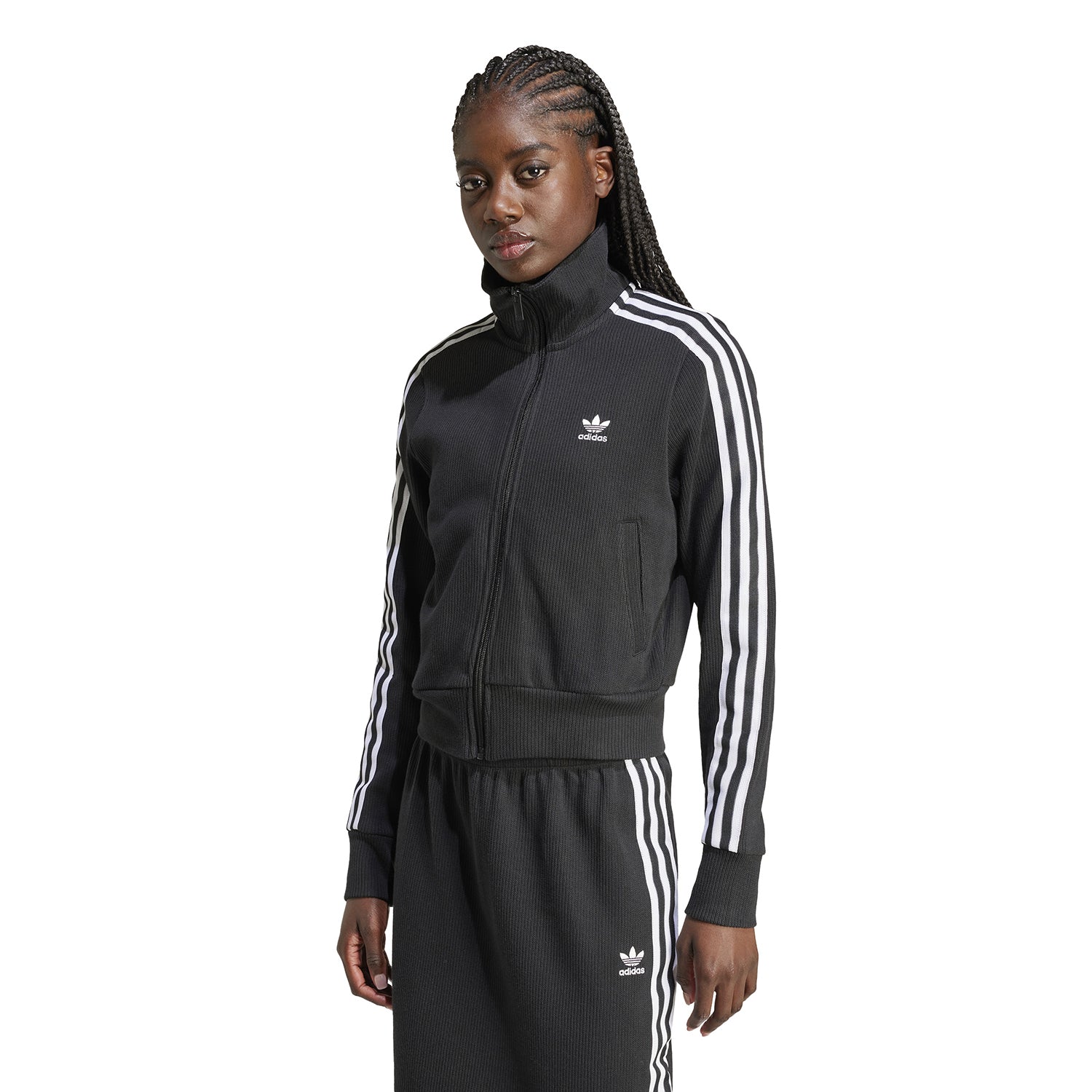 Side angle of the jacket highlighting the three-stripe adidas branding and ribbed cuffs