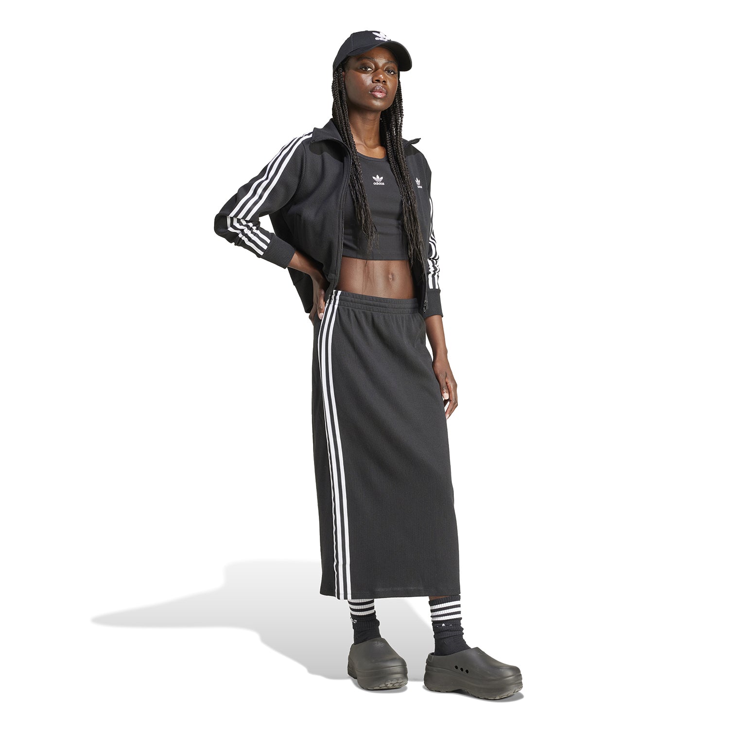 Lifestyle shot of the jacket styled with jeans, ideal for casual outings or light workouts