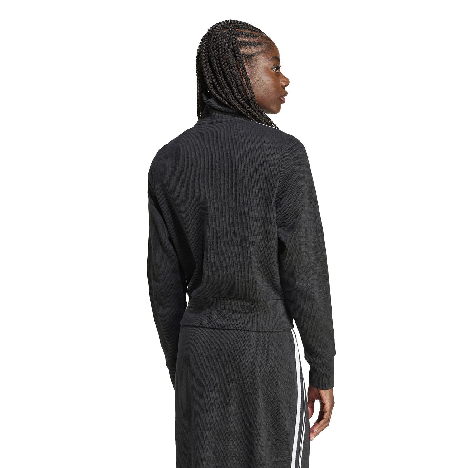 Lifestyle shot of the jacket styled with jeans, ideal for casual outings or light workouts