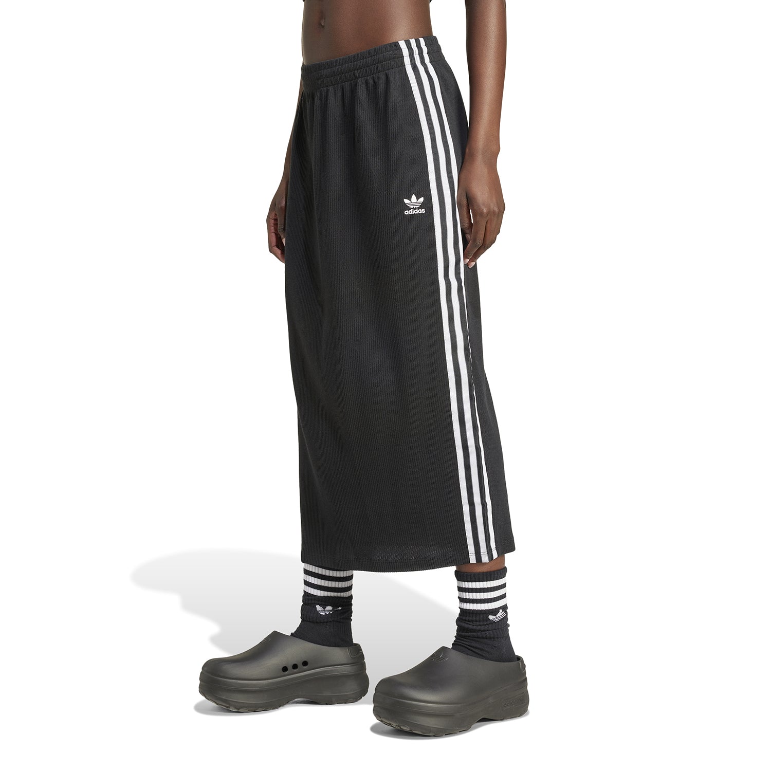 Front view of Adidas womens skirt, highlighting the iconic three-stripe design suitable for everyday wear.