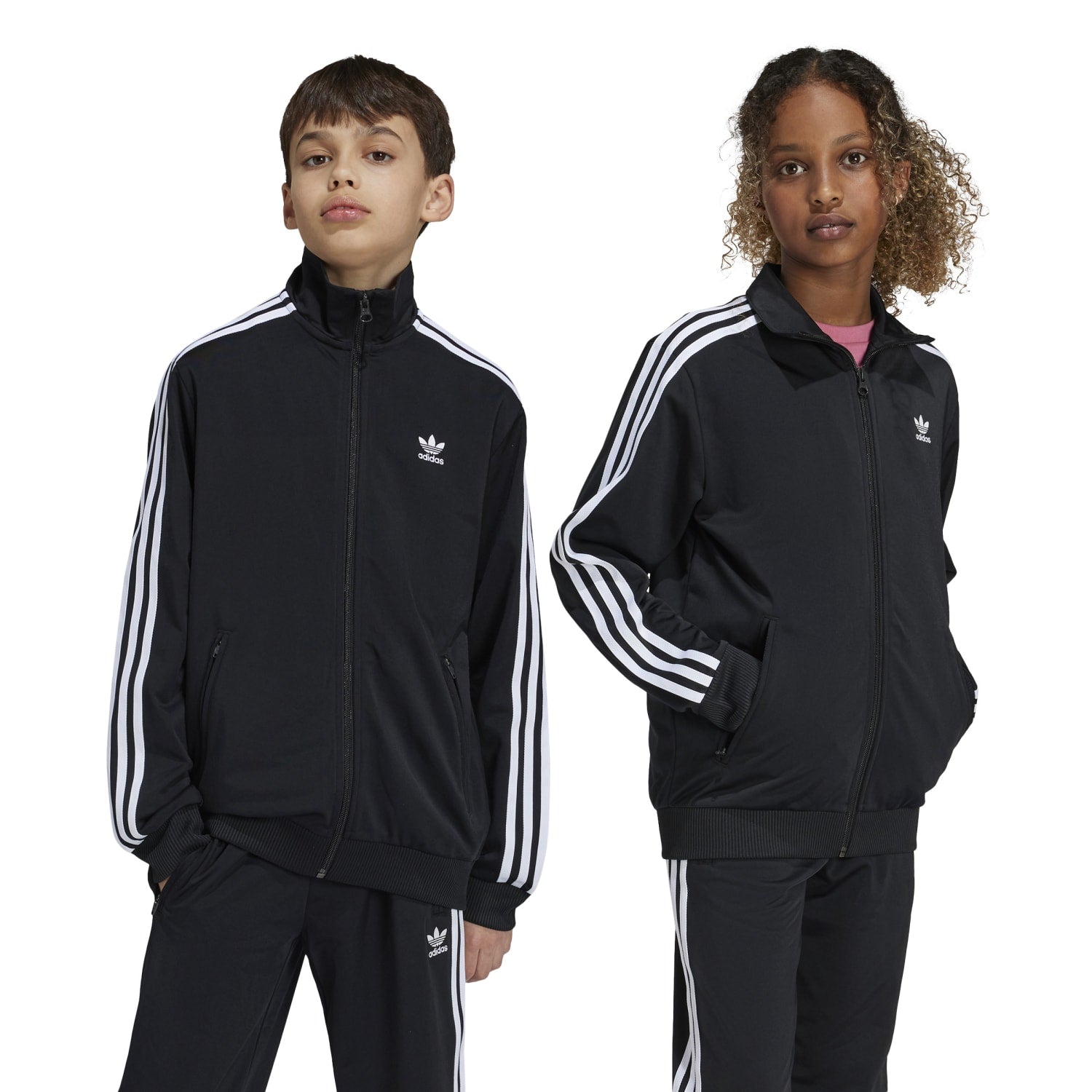 Side angle of the kids athletic jacket, highlighting the comfortable fit.