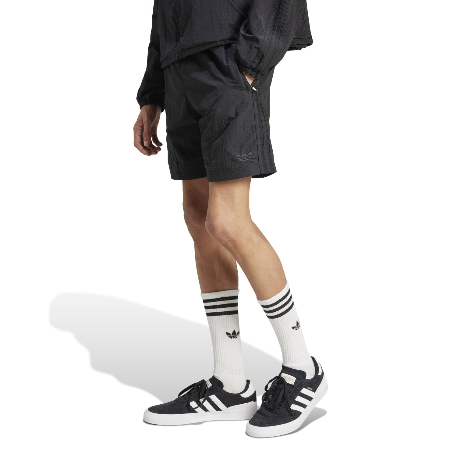 Side view of Adicolor 2000s shorts, ideal for athletic activities like running.