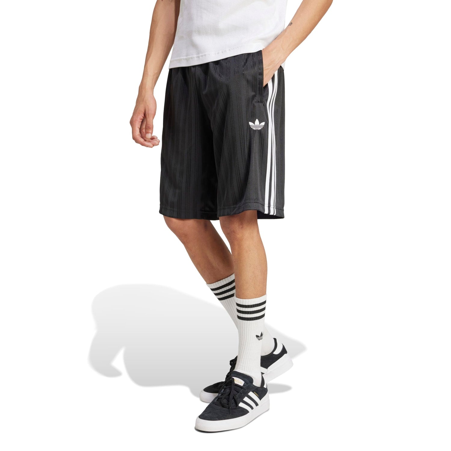 Side view showcasing the jacquard pattern of mens performance shorts during a run