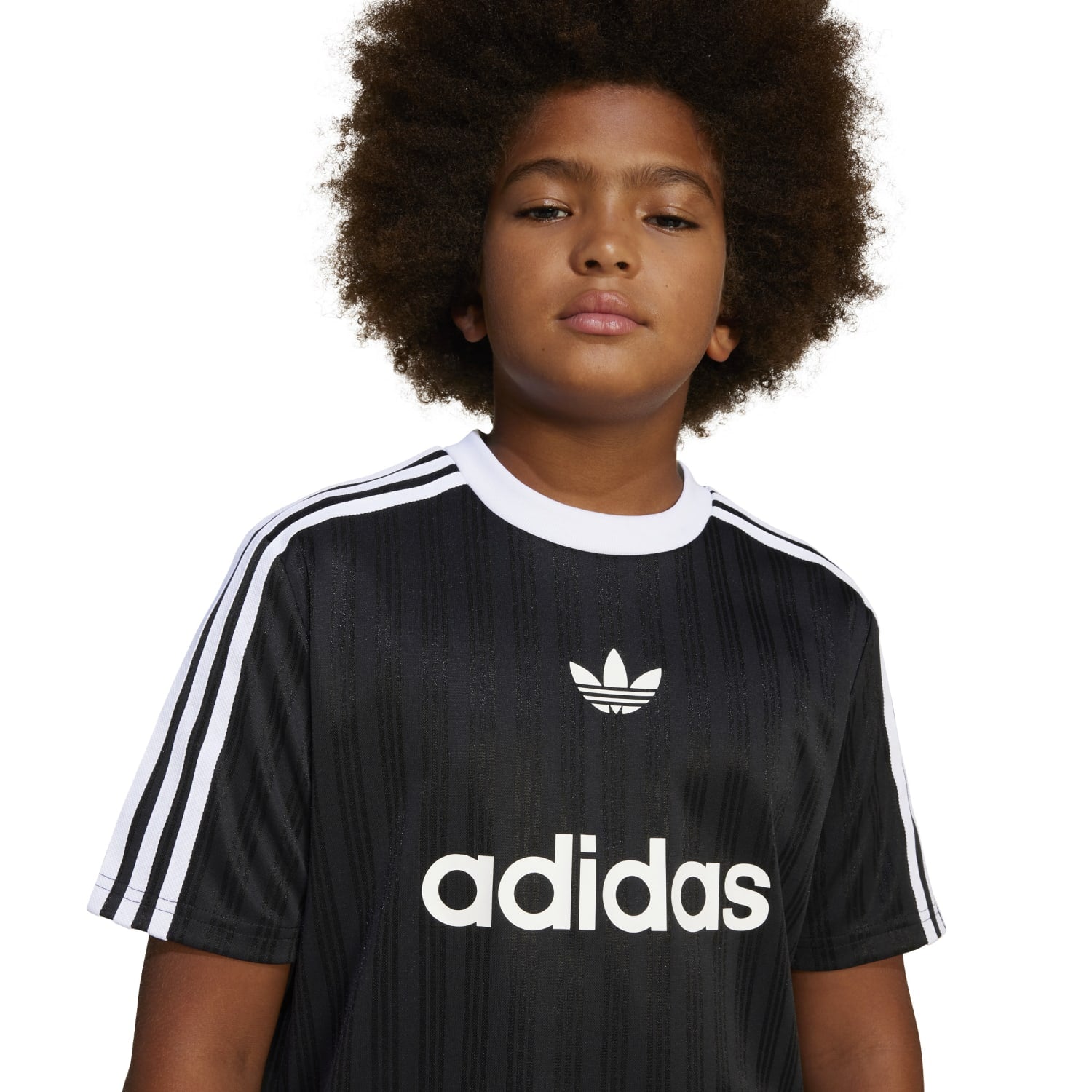 Youth Soccer Spirit Tee in action during practice session.