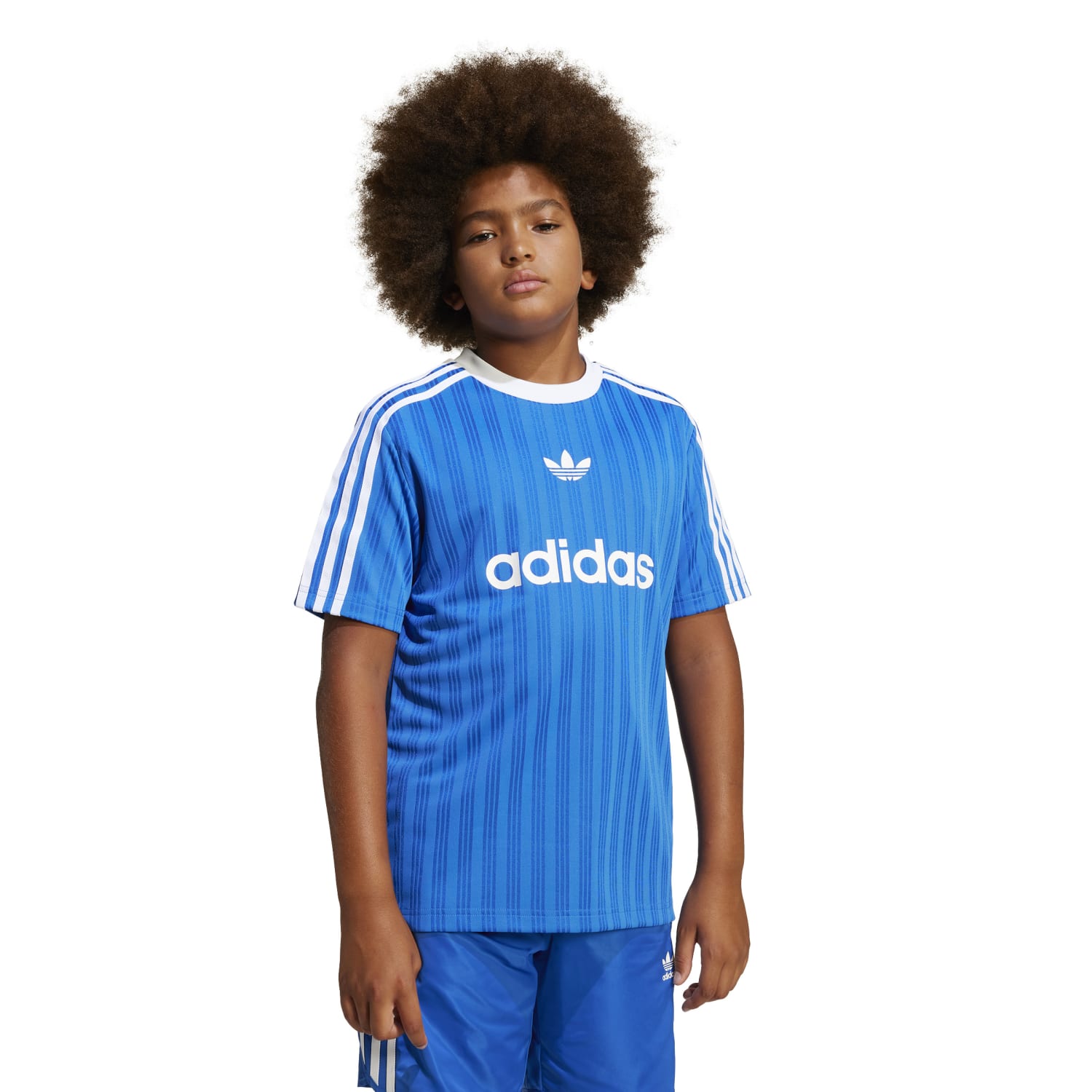 Close-up of breathable fabric in youth soccer jersey