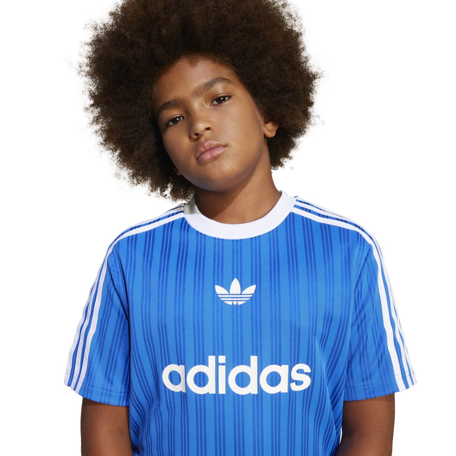 Close-up of breathable fabric in youth soccer jersey