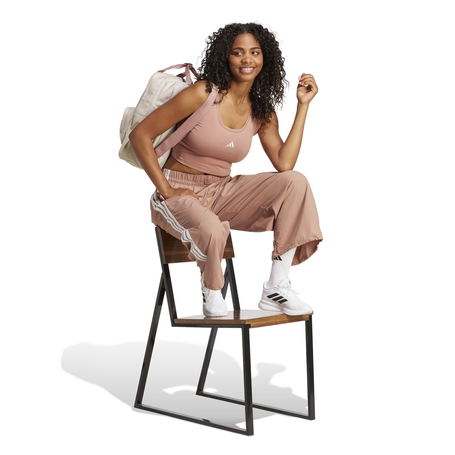 Back view of the Adidas Womens wide leg pants, featuring the back flap pocket and eco-friendly material.