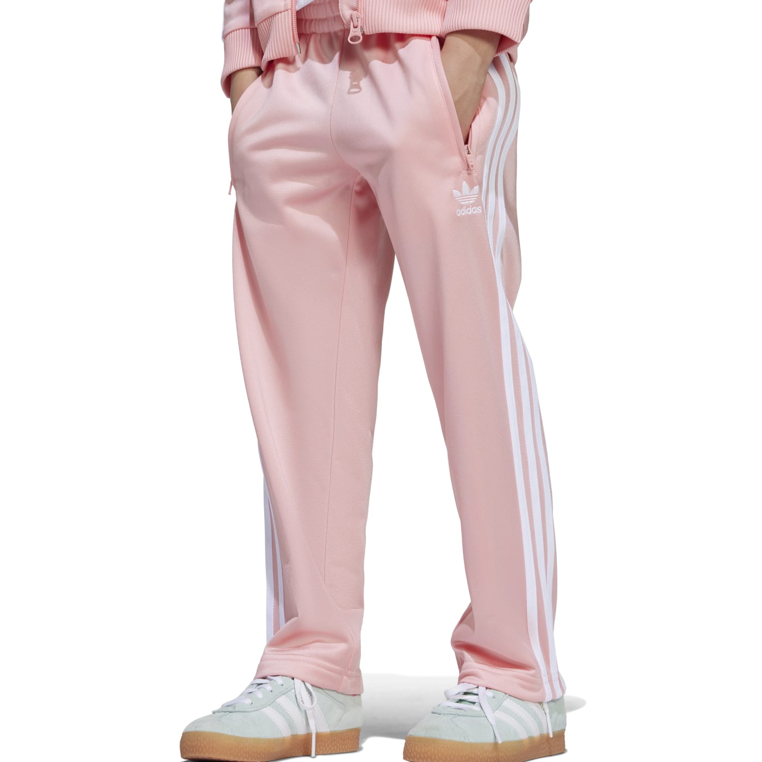 Close-up of kids athletic clothing featuring signature three stripes