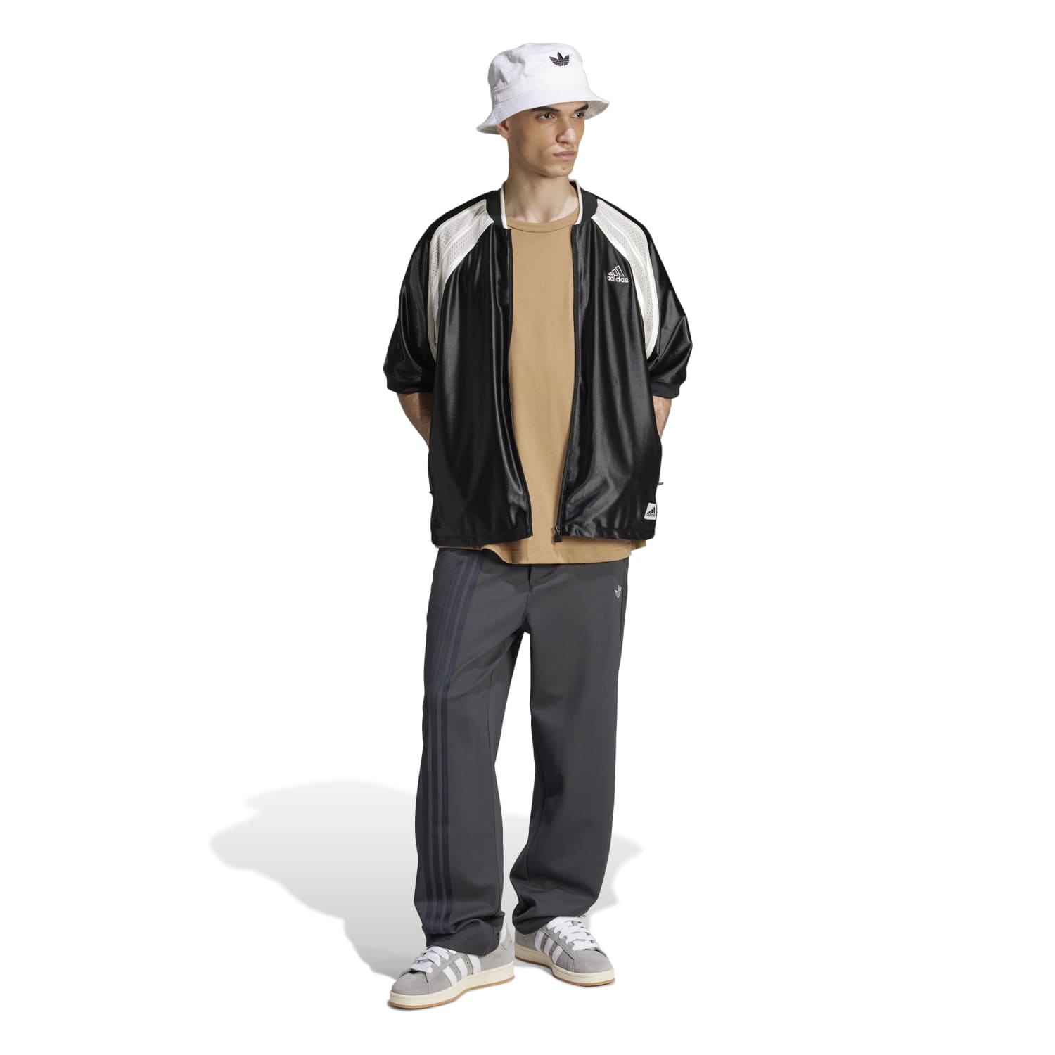 Casual outfit featuring the Adidas Neu Classics tee paired with shorts and sneakers.