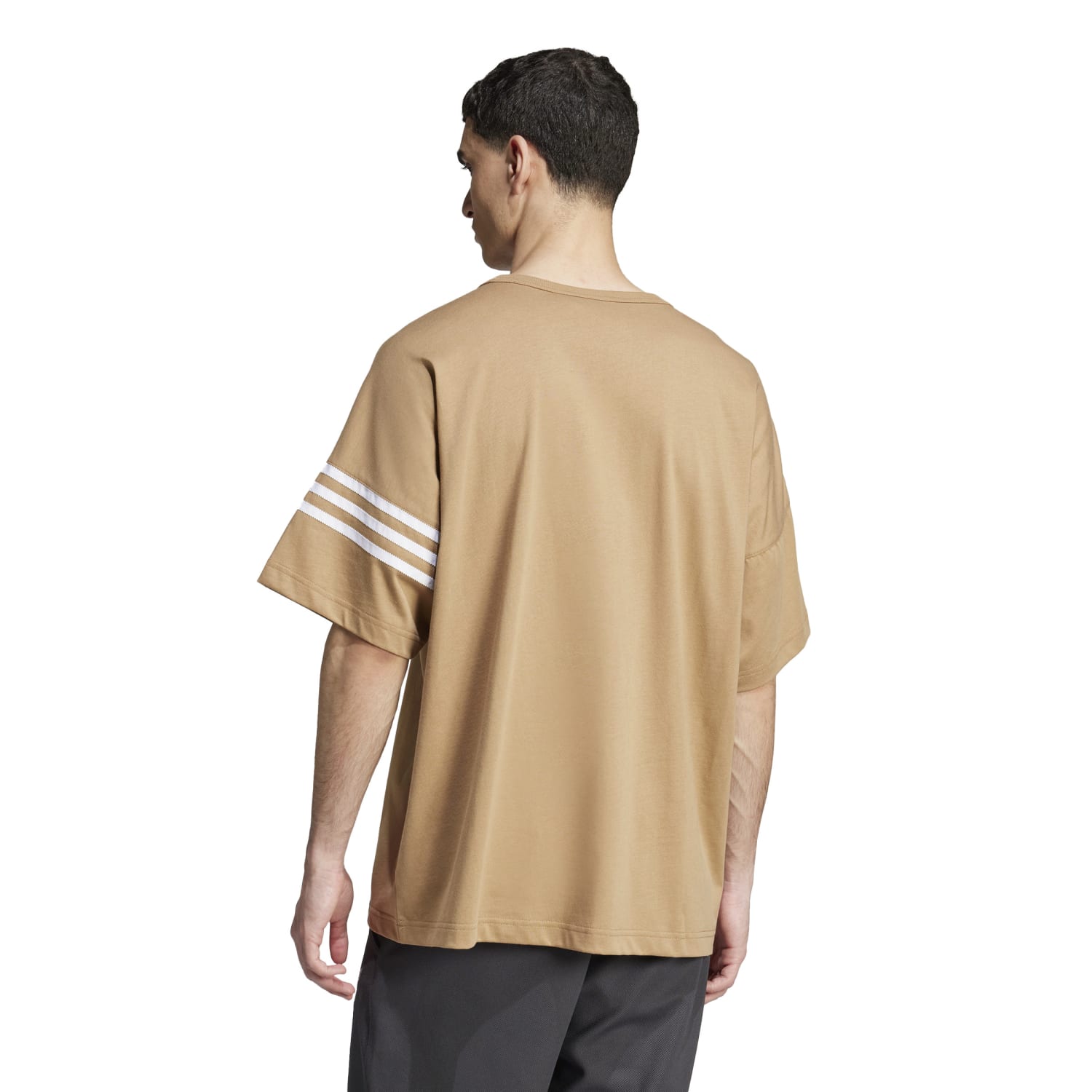 Casual outfit featuring the Adidas Neu Classics tee paired with shorts and sneakers.