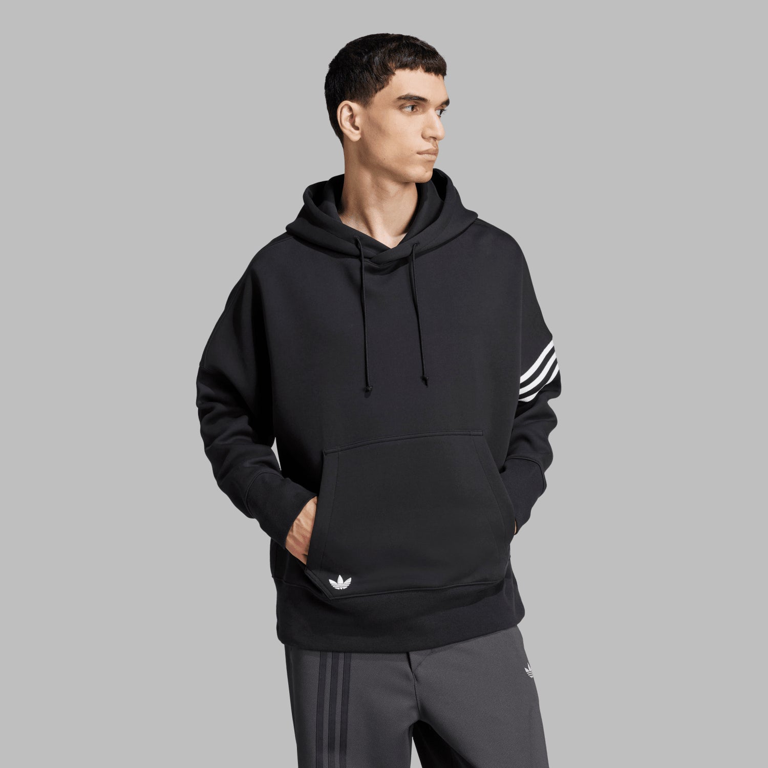 Man wearing retro hoodie with kangaroo pocket for casual wear