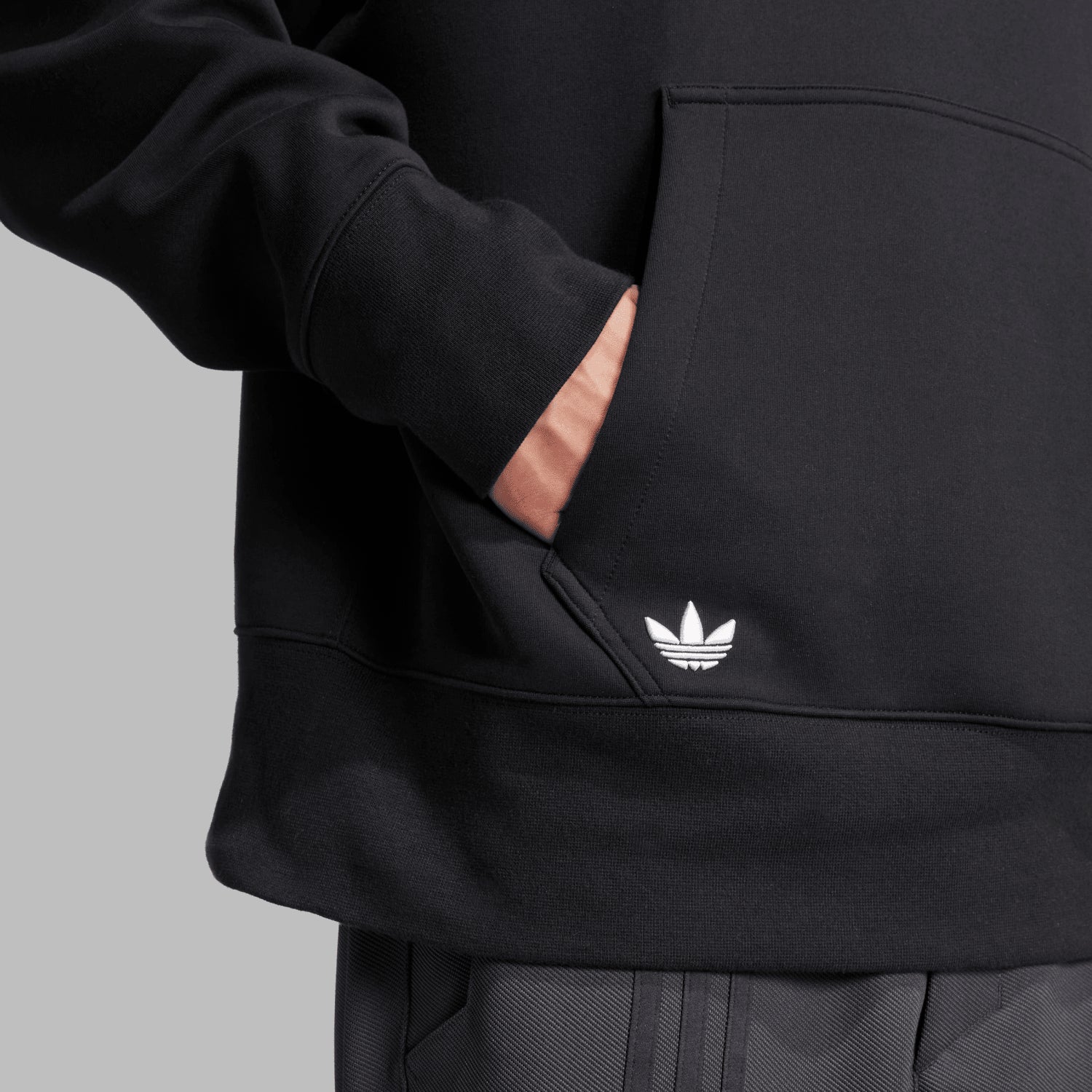 Man wearing retro hoodie with kangaroo pocket for casual wear