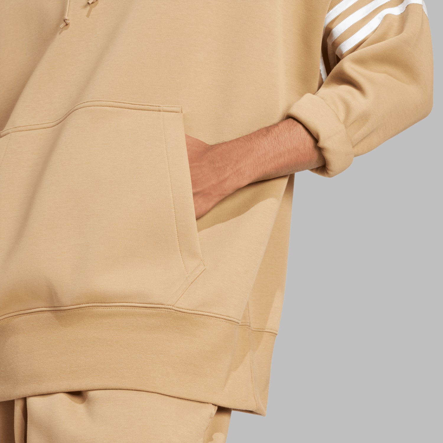 Close-up of fabric and ribbed cuffs on mens hoodie