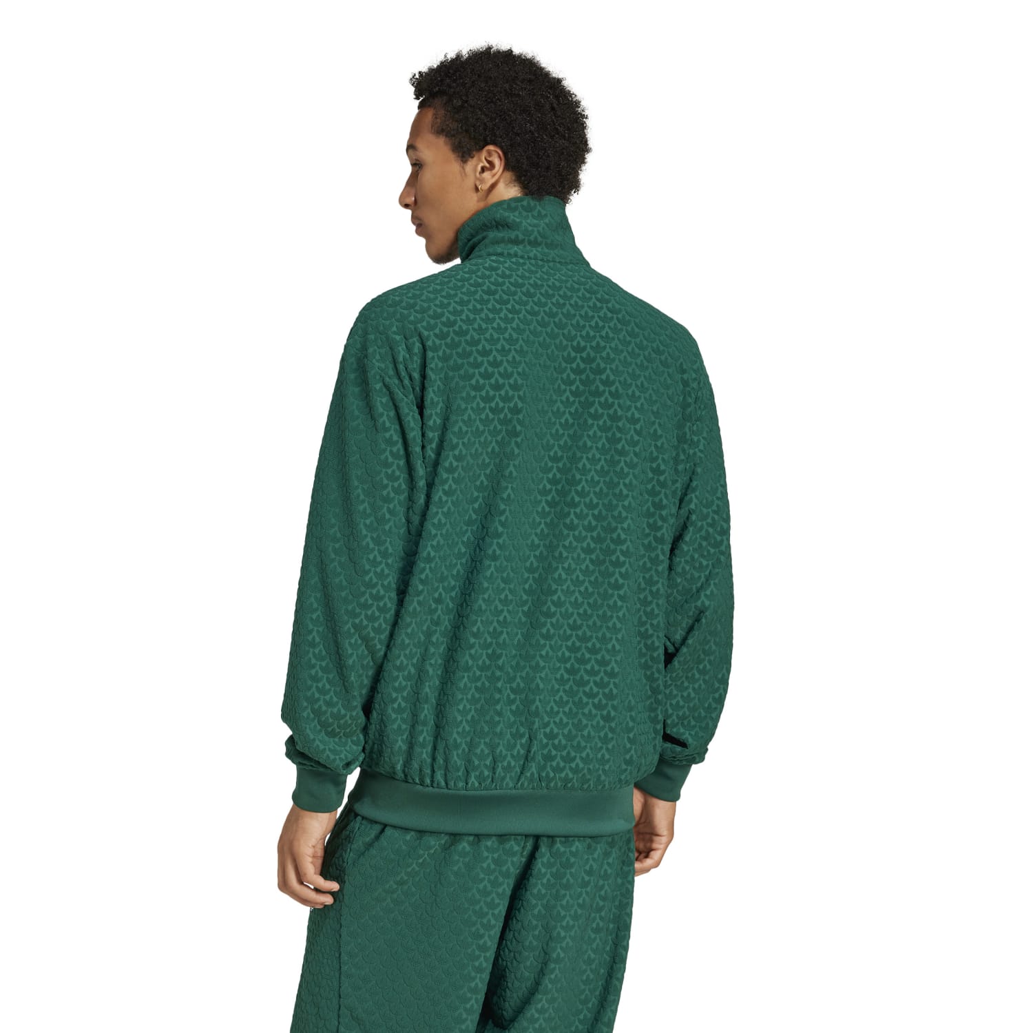 Close-up of the adidas logo and pattern on the mens track jacket