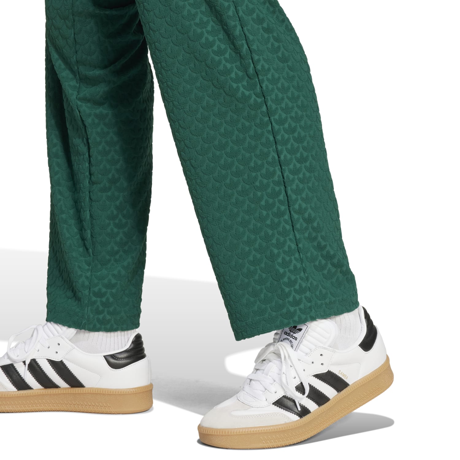 Side view of Adidas Classic Monogram Mens Track Pants, ideal for athletic activities and casual outings.