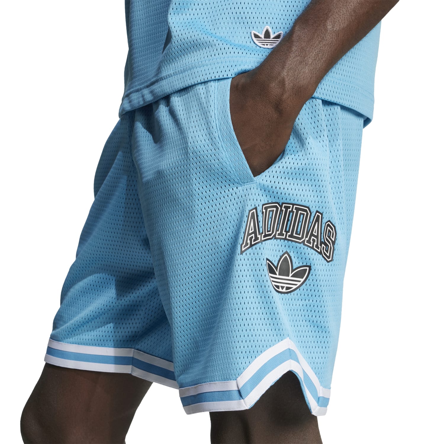 Side angle of mens basketball shorts with pockets, perfect for athletic activities.