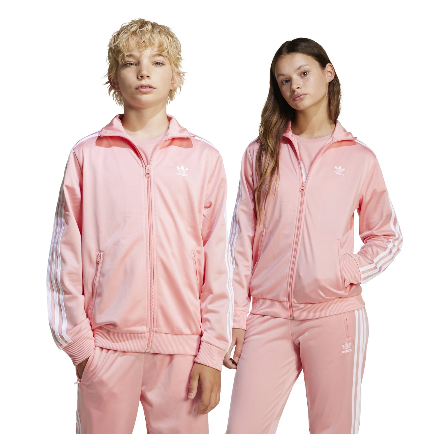 Child wearing adidas Firebird youth track jacket during outdoor activity