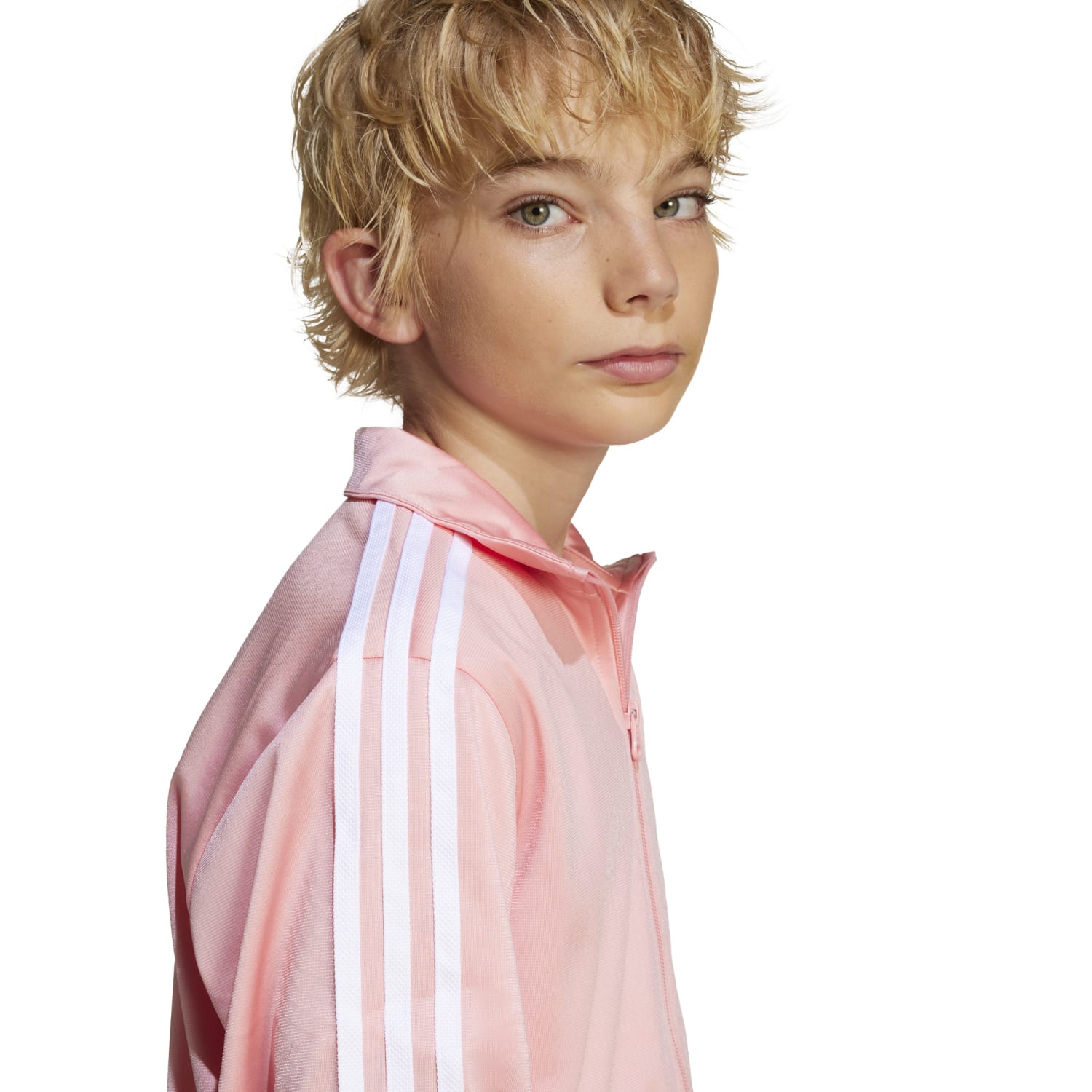 Child wearing adidas Firebird youth track jacket during outdoor activity