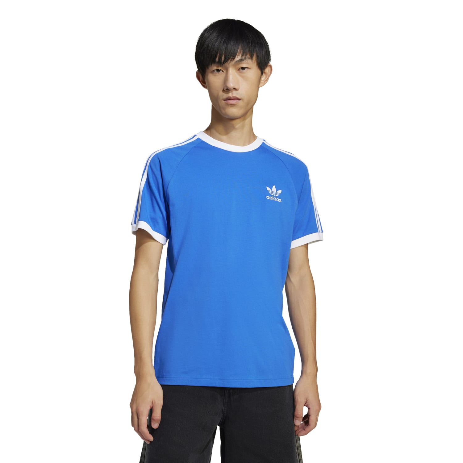 Model wearing slim fit cotton T-shirt with dark jeans for a casual look