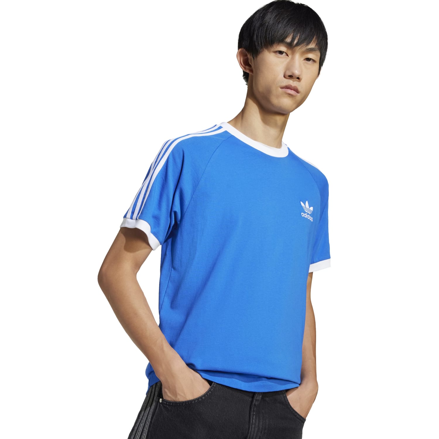 Close-up of adidas 3-stripe mens tee showing the contrast hem and embroidered logo