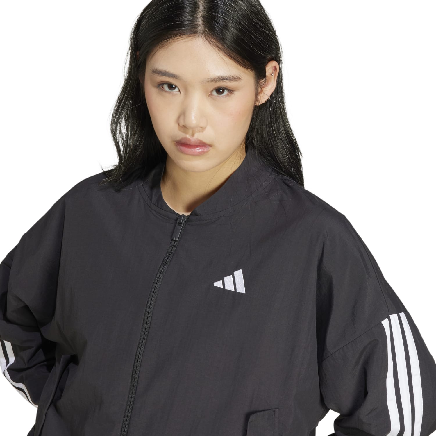 Close-up of the lightweight recycled fabric and fitted cuffs on the womens bomber jacket