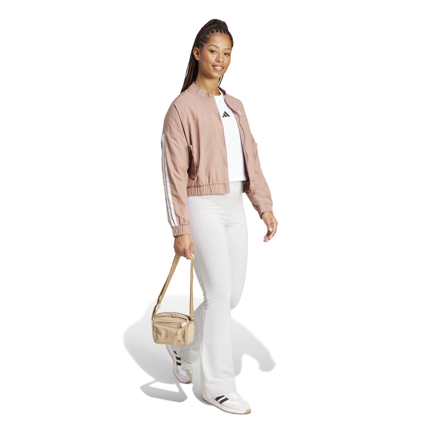 Athletic bomber jacket for women, made from 100% recycled material, suitable for breezy spring days.