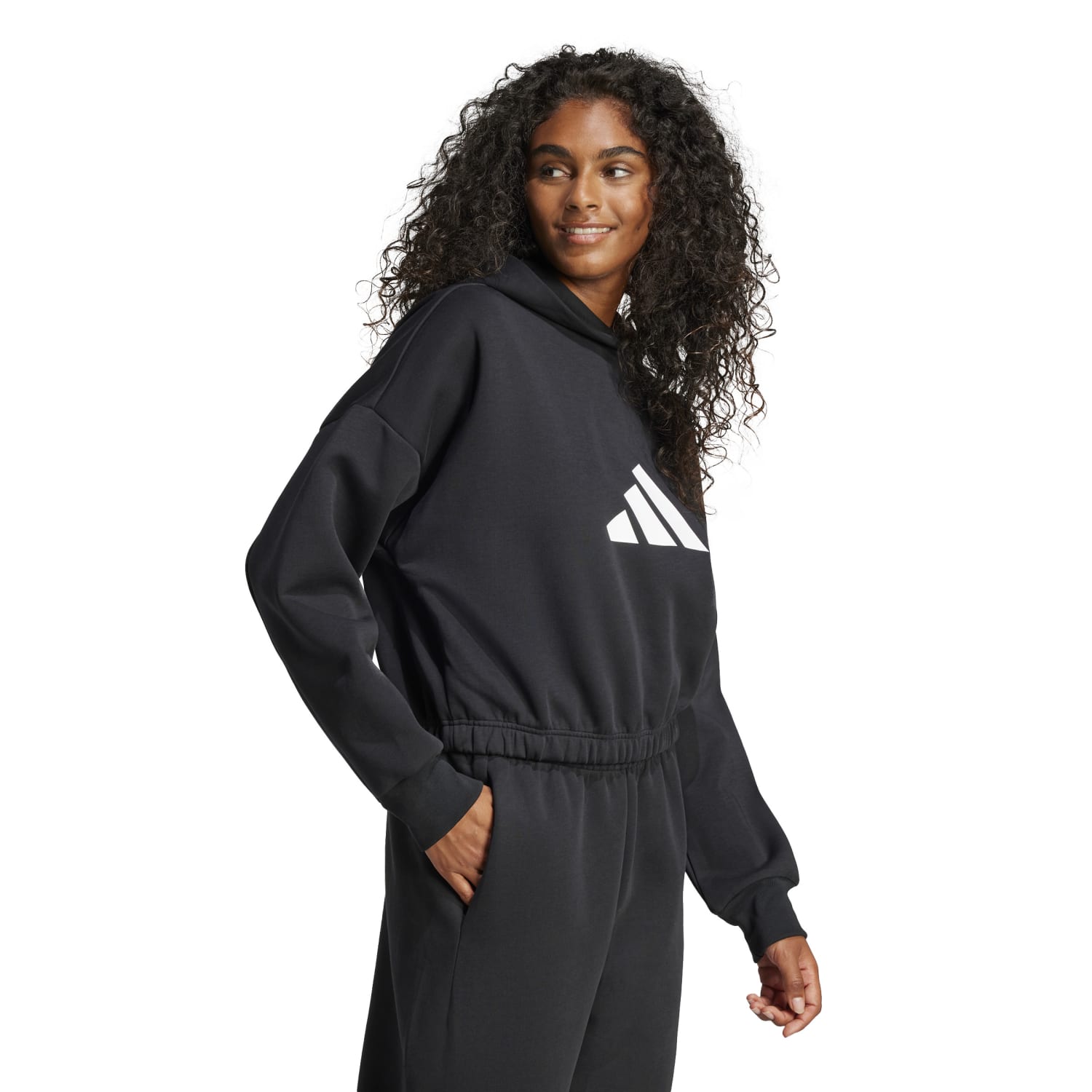Model wearing adidas womens hoodie for casual outdoor look