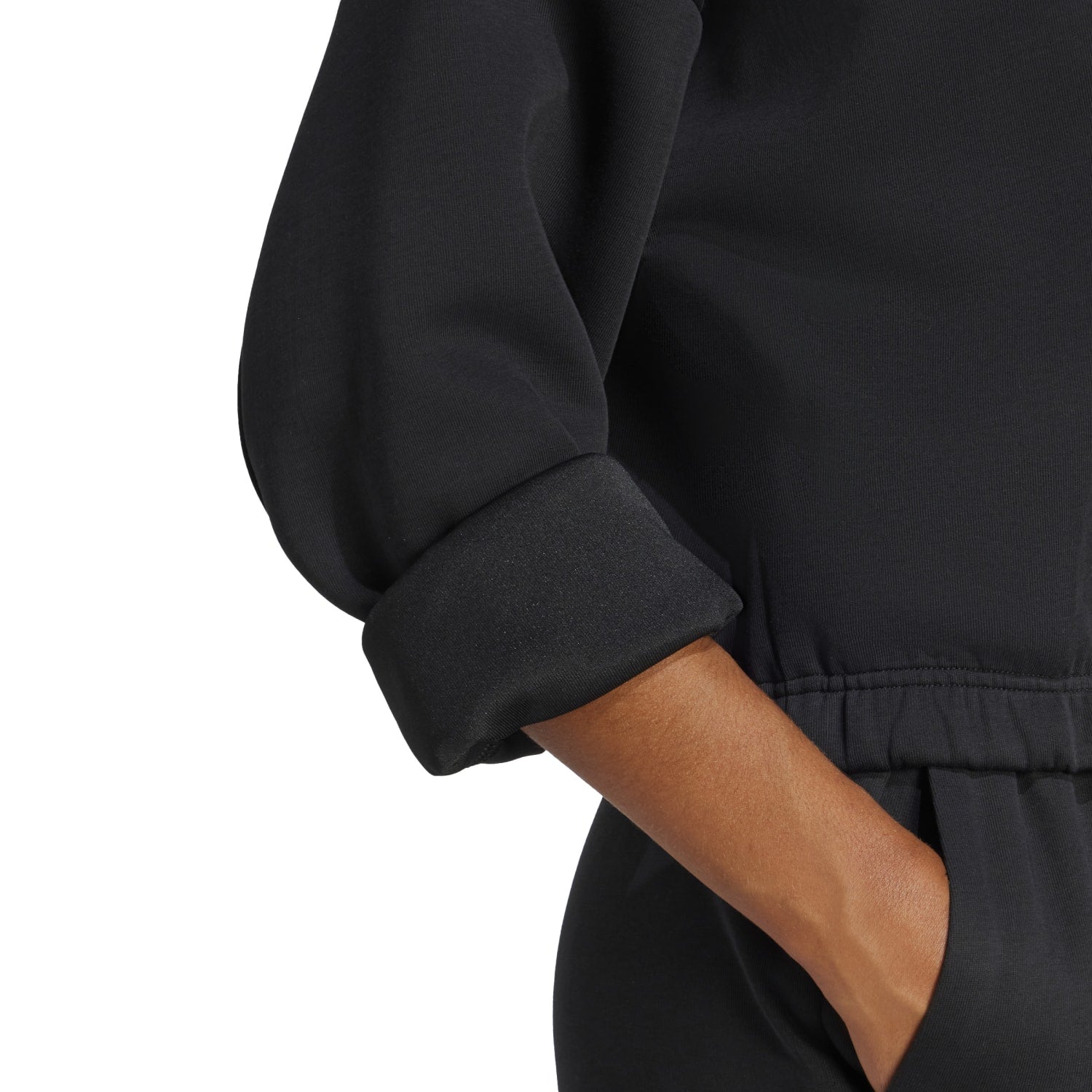 Close-up of the hoodie’s iconic three-stripe design on sleeve