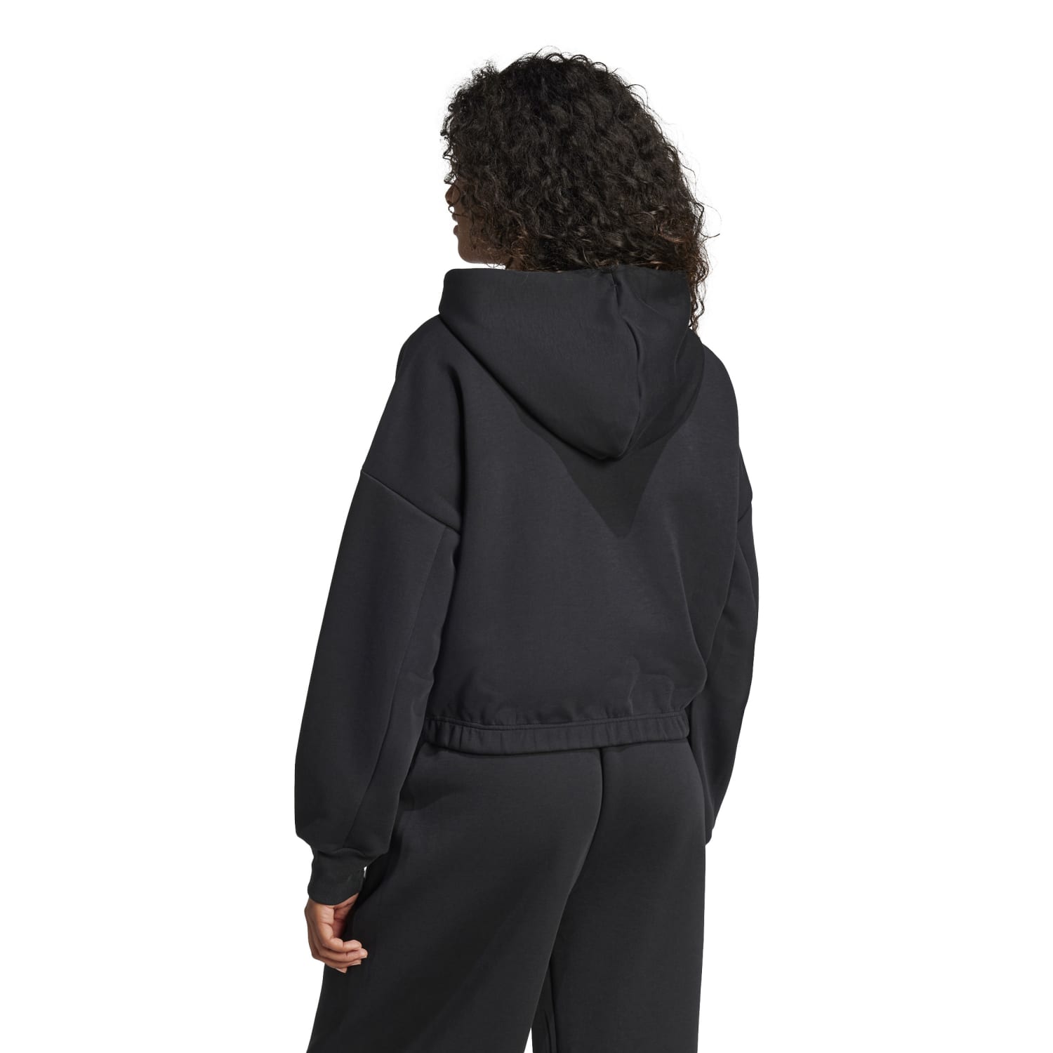 Model wearing adidas womens hoodie for casual outdoor look