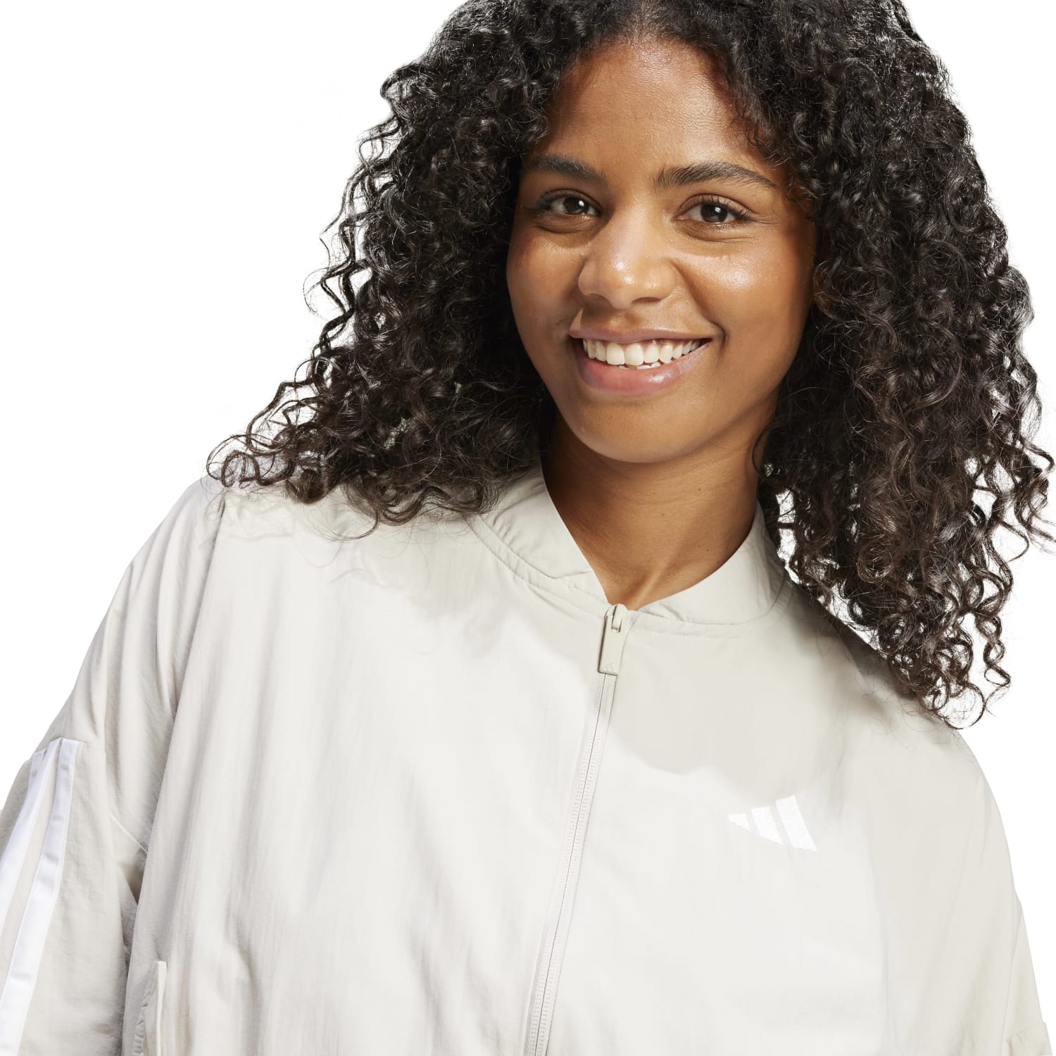 Front view of the Essential Womens Woven Bomber Jacket with Stripes on a model in an outdoor setting.