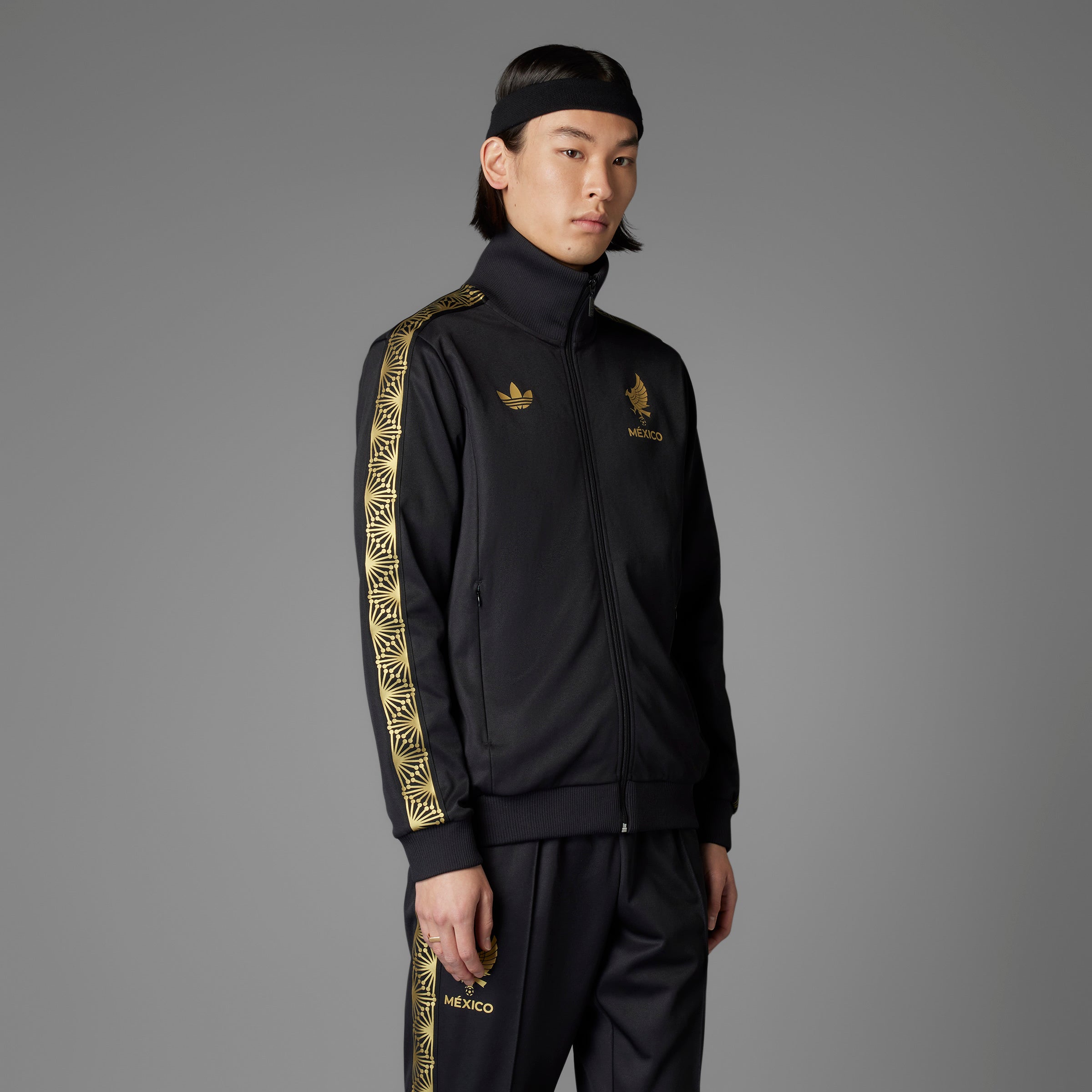 Front view of Adidas Mexico Heritage Track Jacket showcasing the team crest and full zip design.