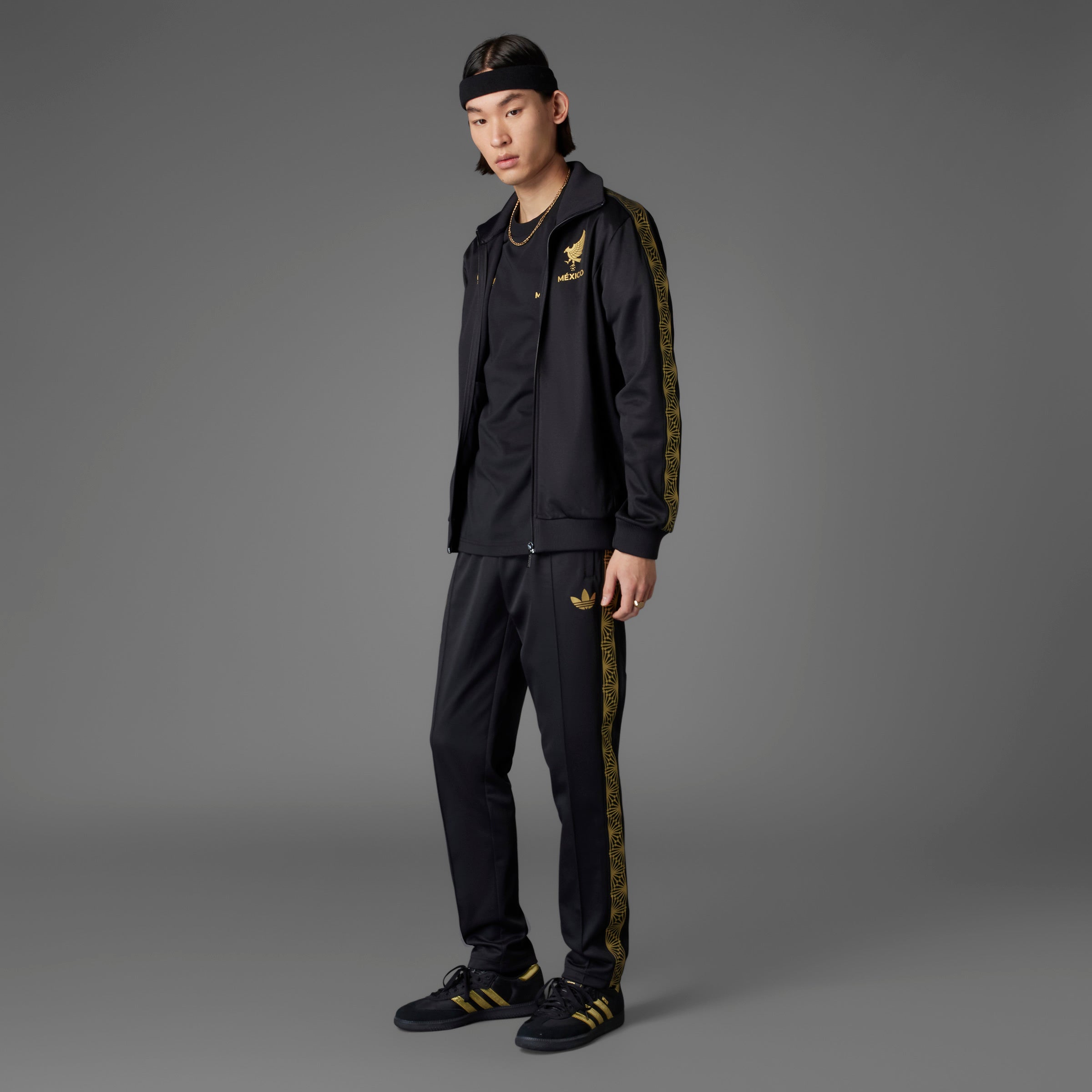 Adidas Mexico pants displayed with front pockets, perfect for casual wear or cheering on your team.